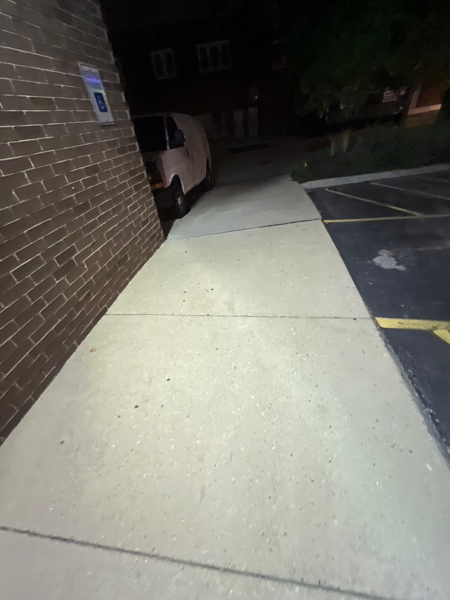 Commercial sidewalk cleaning. by Northern Power Washing LLC.