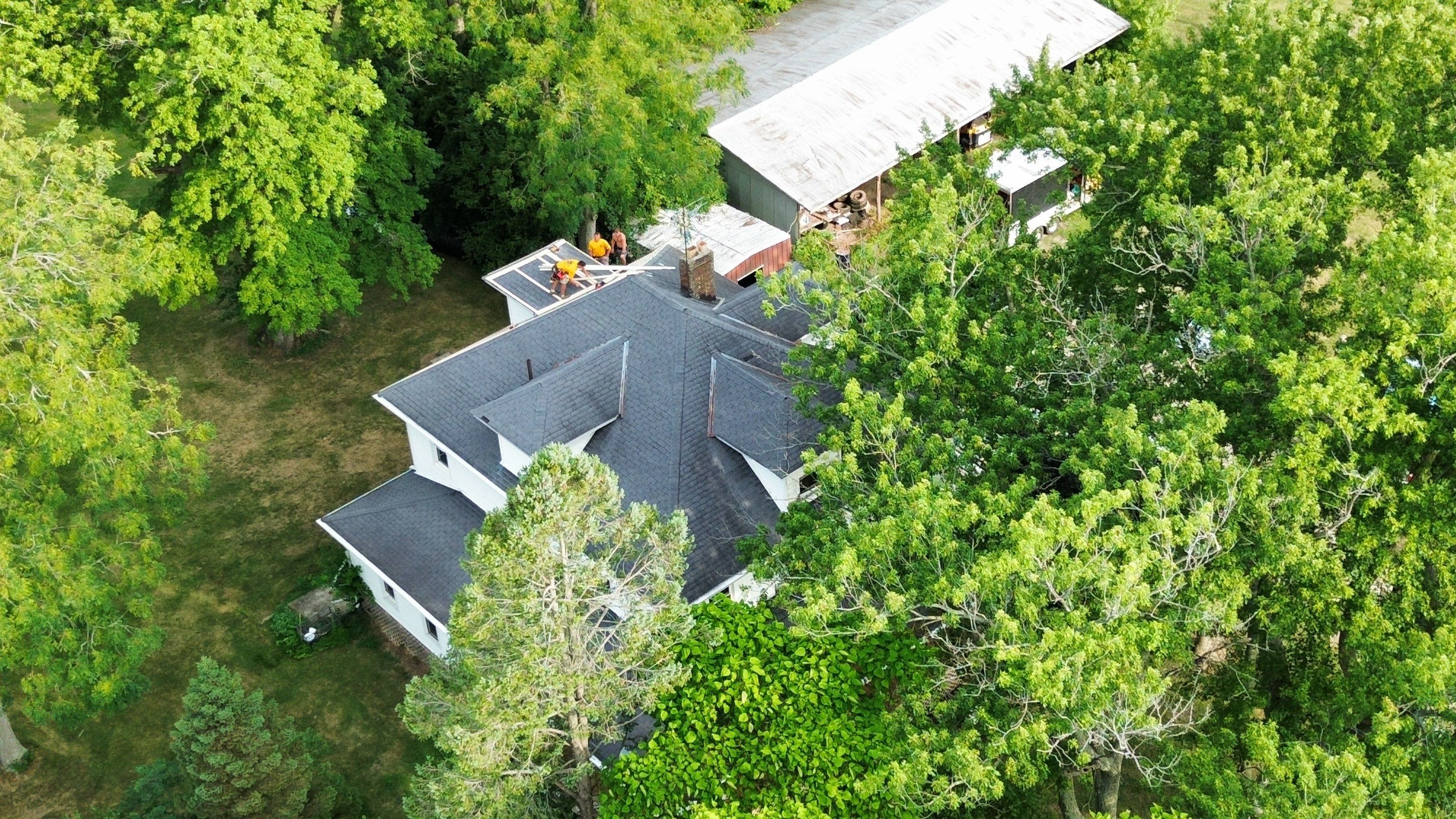 Residential Roofing Installation using Performance Panel Metal - Copper Metallic by RoofX 