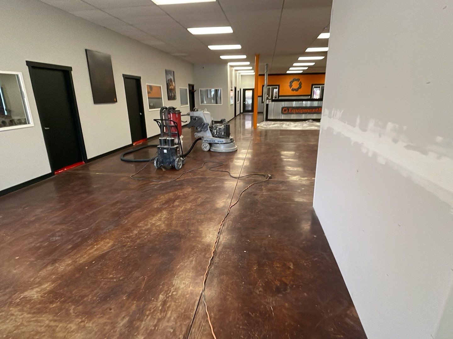 Equipment Share Commercial Floor Transformation using Smoke w/ 5% Orange by Croc Coatings, LLC