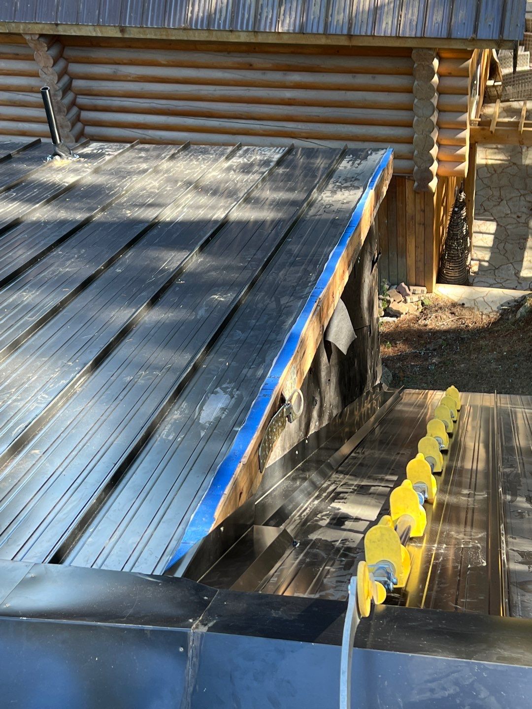 Residential ReRoofing Installation using 12" Prolok metal  by Top Notch Roofing Inc