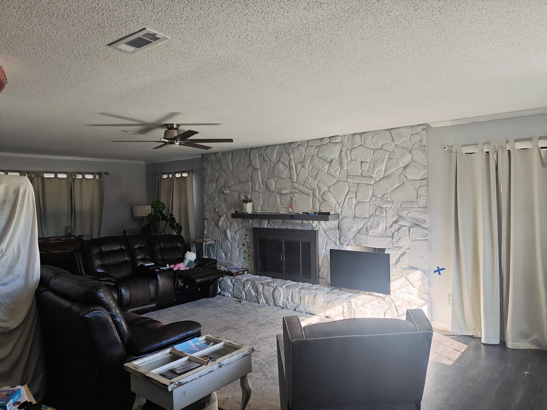 Interior Renovation Featuring Stone Fireplace and Subfloor Restoration in Valdosta by Trinity General Contracting Pros