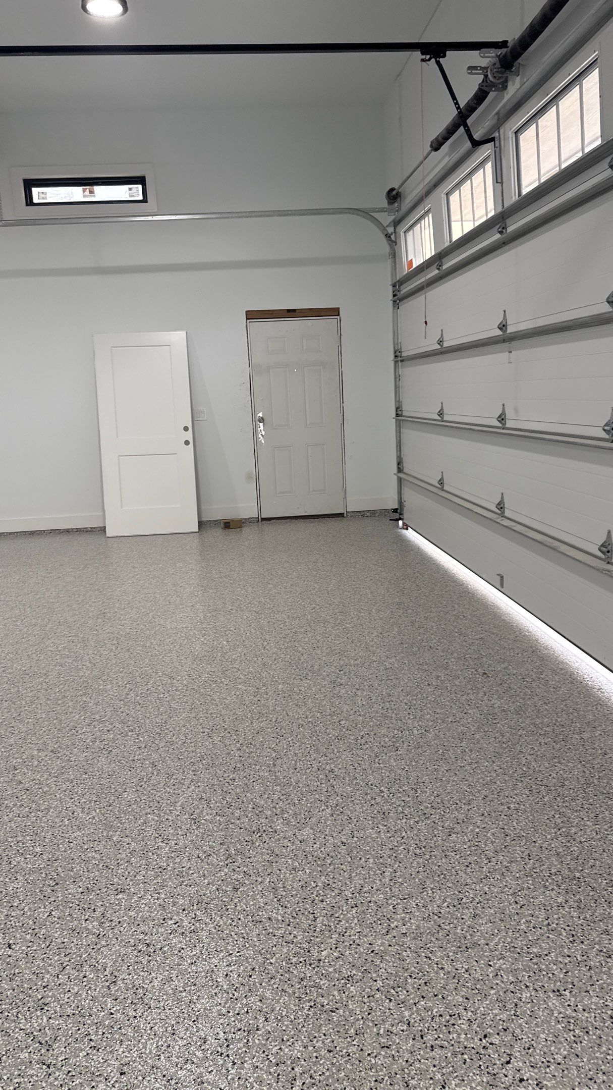 Chris Made The Great Choice Of Cabin Fever Flake Floor by Banner Garage