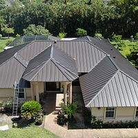 24ga 1.5" Mechanical Seam Dark Bronze by Total Roofing System The Metal Roof Experts