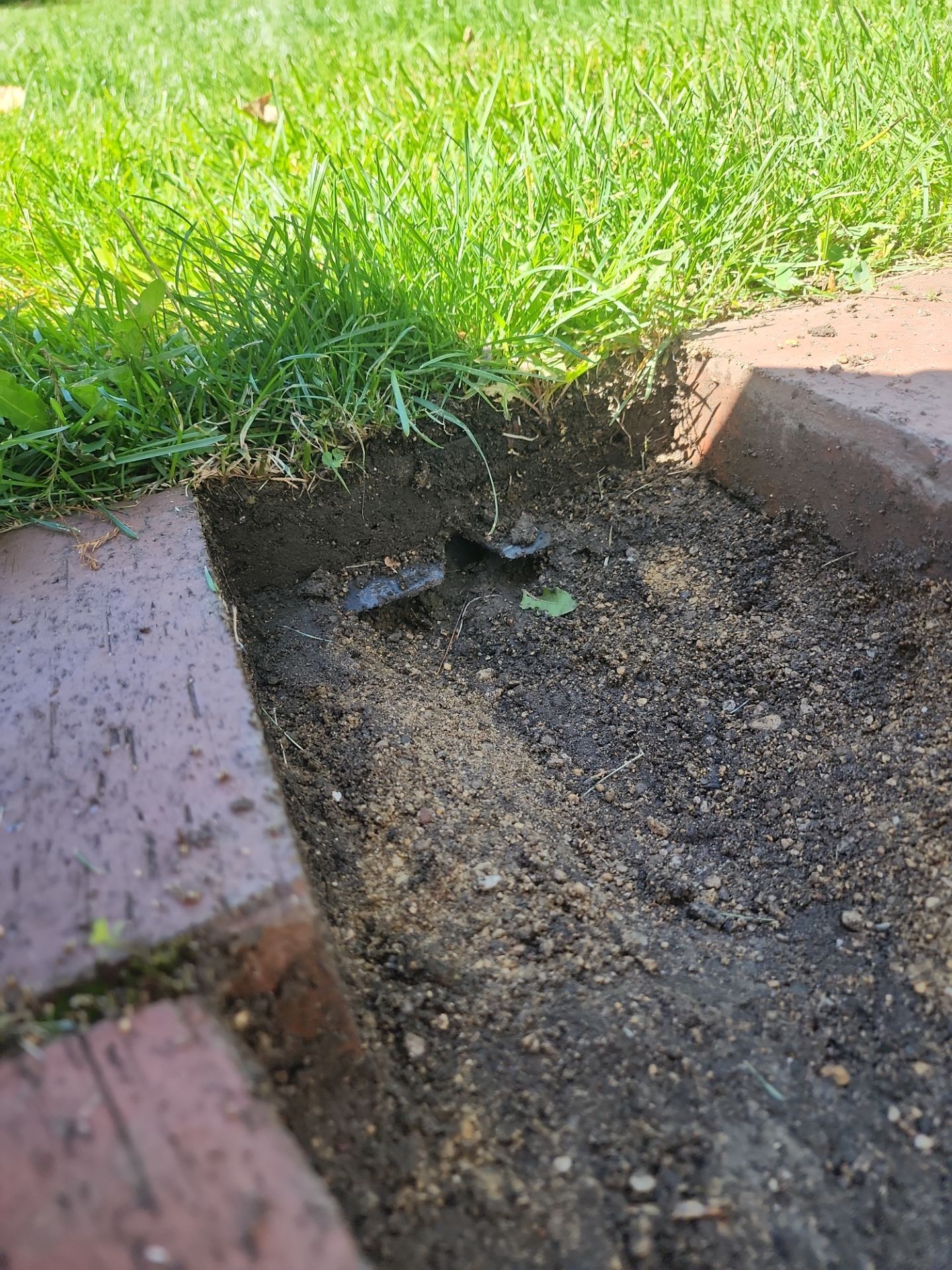 Brick paver repair, cleaning and sealing by Northern Power Washing LLC.