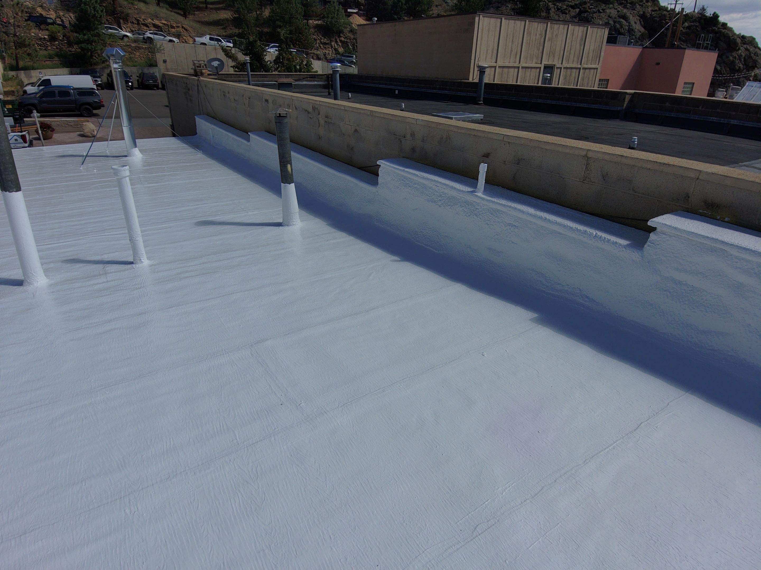 Estes Park "The Taffy Shop" Before & After Gaco Coating by Blue Peaks Roofing LLC