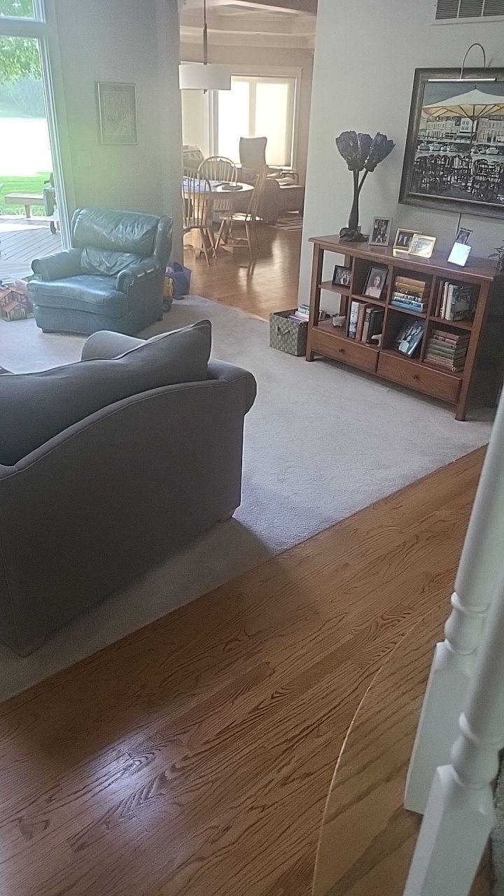 Ann Arbor Elegance: Red Oak and Walnut Living Room Masterpiece by Ann Arbor Hardwoods