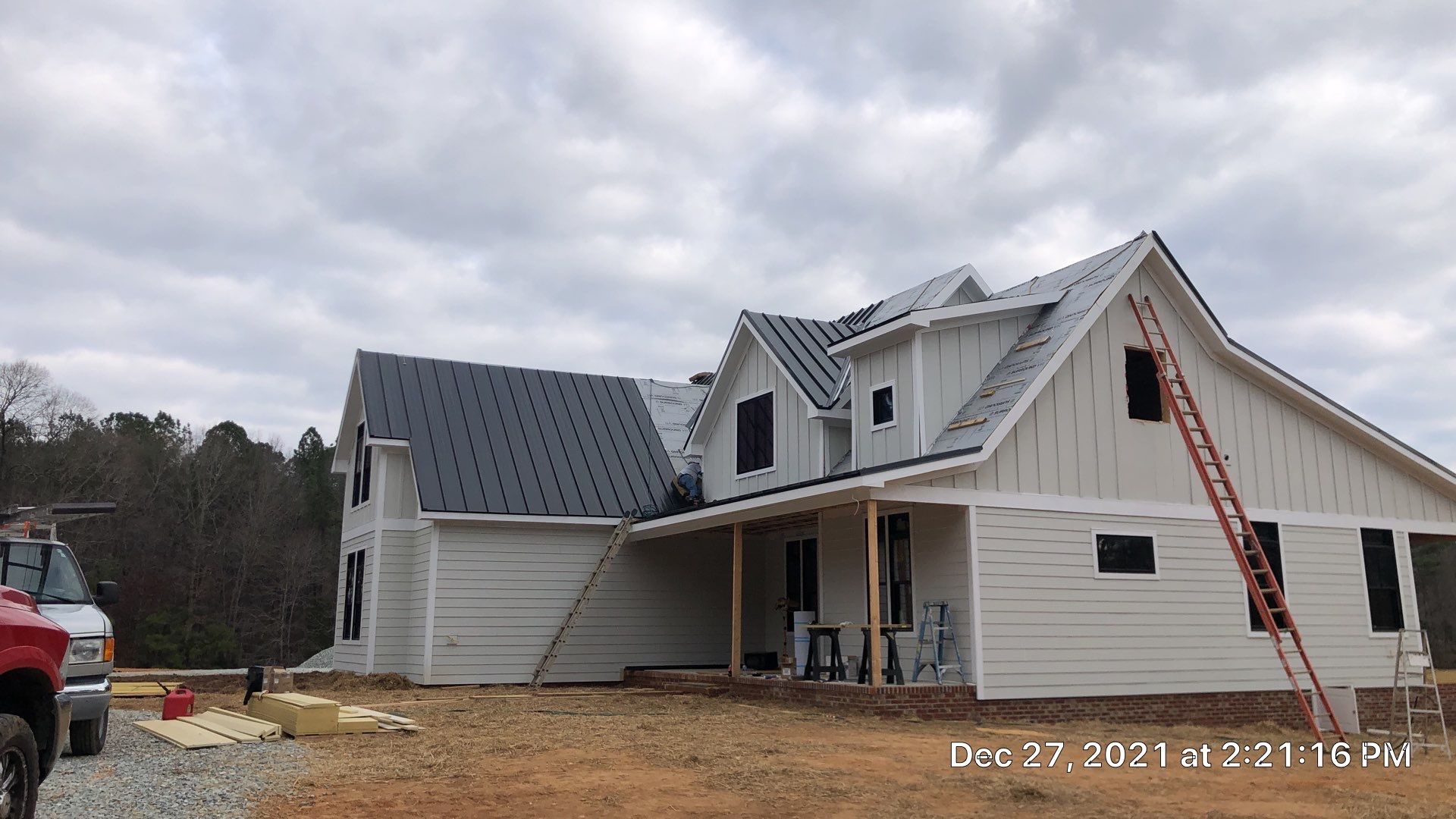 Custom Home Metal Roof Installation by Just In Time Roofing and Restoration