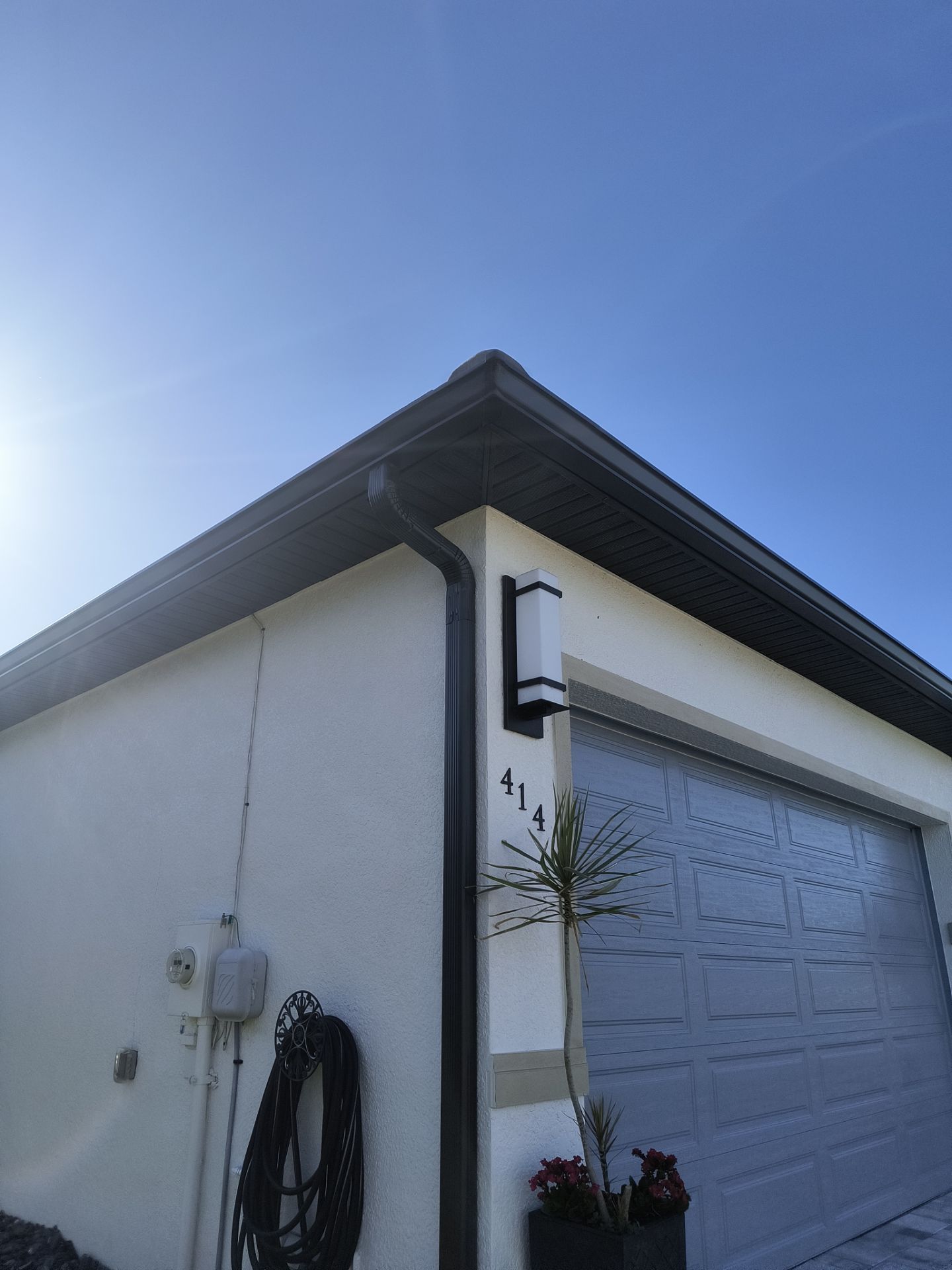 Dark Bronze 7-Inch Gutter Installation in Cape Coral FL by Gutter Professors