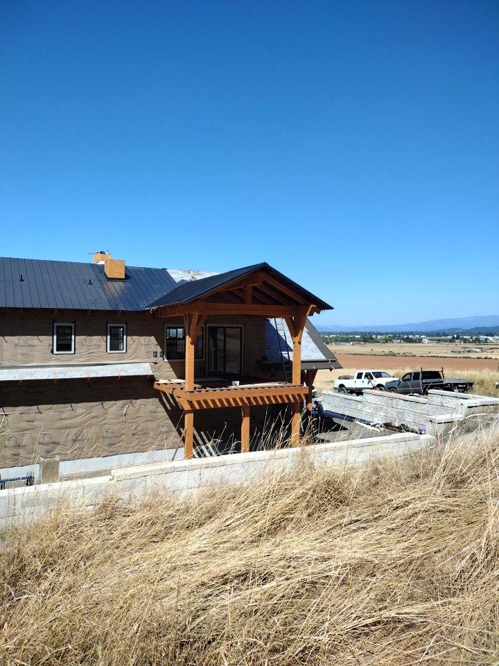 Residential Metal Roof Installation using Taylor Metal Snap Lock Metal Color: Black by Orezona Building & Roofing Company, Inc.