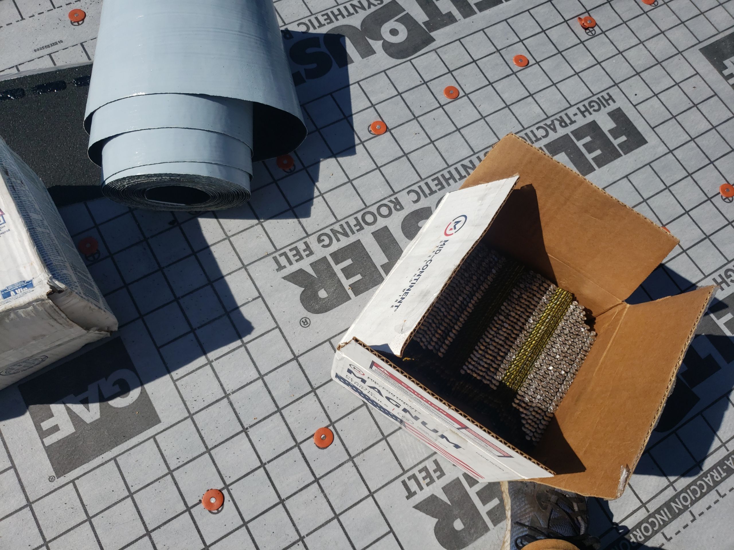 Residential Roofing Installation using Roof Replacement by American Roofing & Construction LLC
