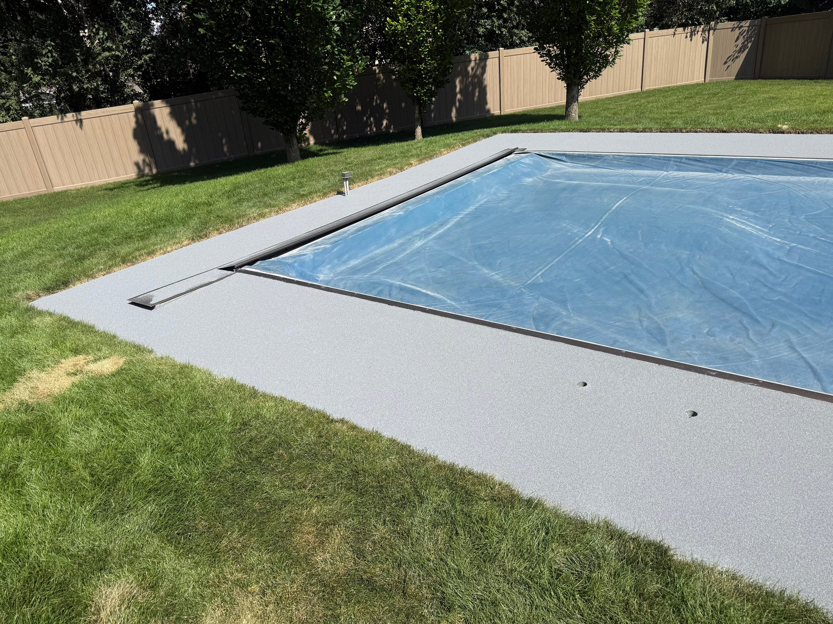 Residential Pool Deck Resurfacing in Sioux Falls by Select Painting, Coatings & Garage Cabinets
