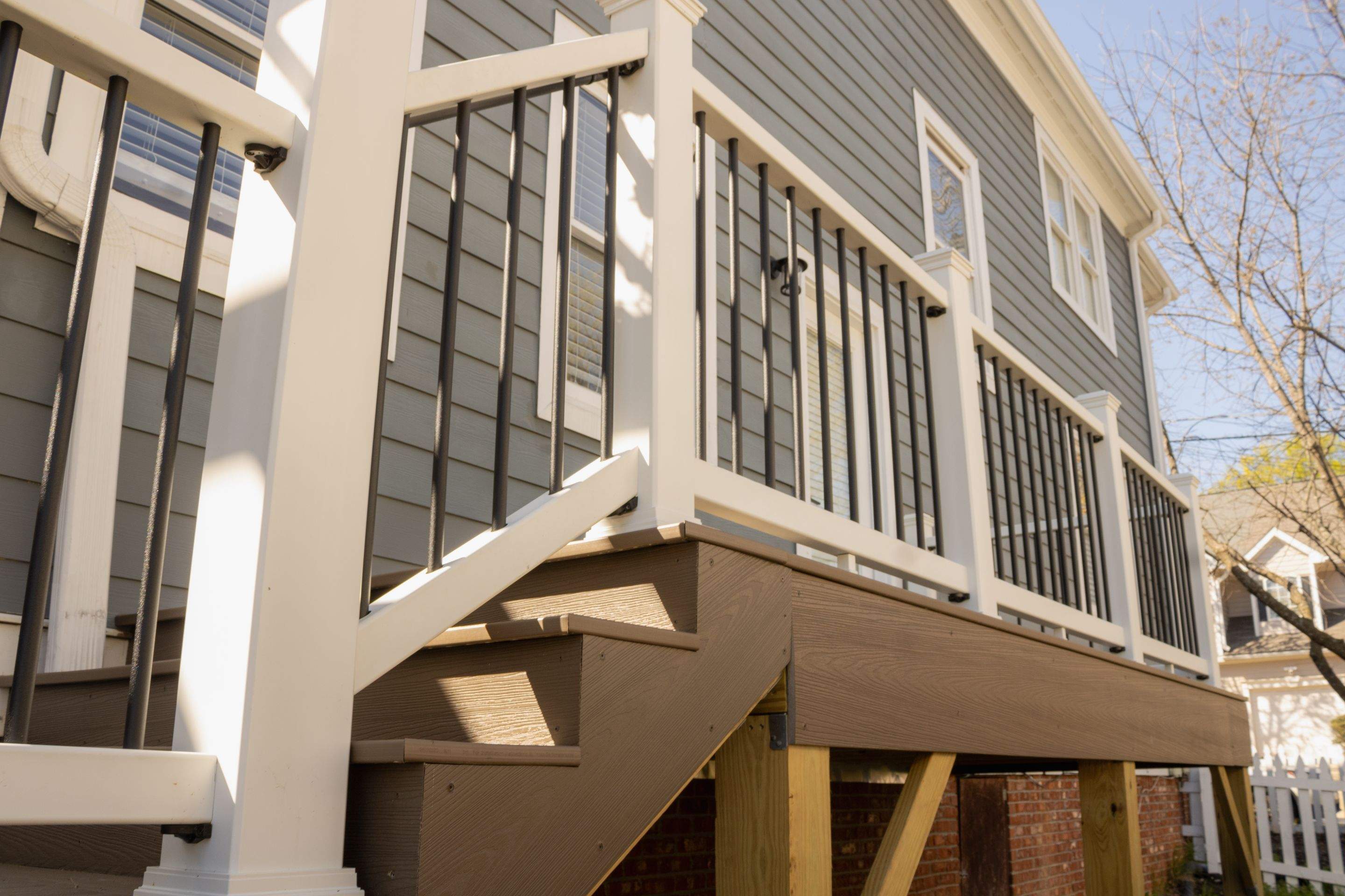 Atlanta, GA Deck Rebuild and Pergola Build using Deckorators Venture Series Decking, Trex Composite Railing, and Pressure Treated Pine by Nelson Exteriors 