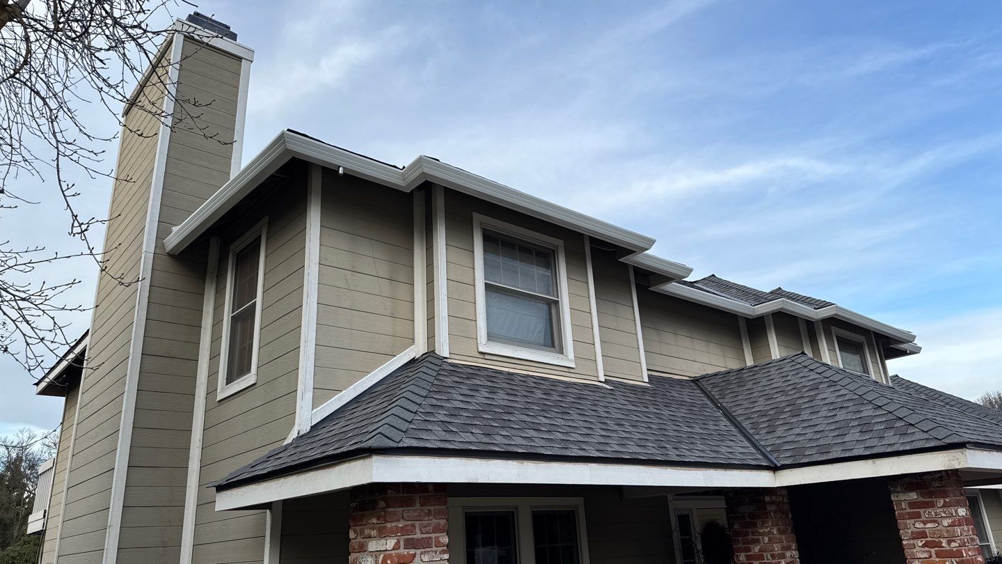 New shingles and gutters using GAF Timberline HDZ shingles and aluminum gutter by Straight Edge Roofing Inc