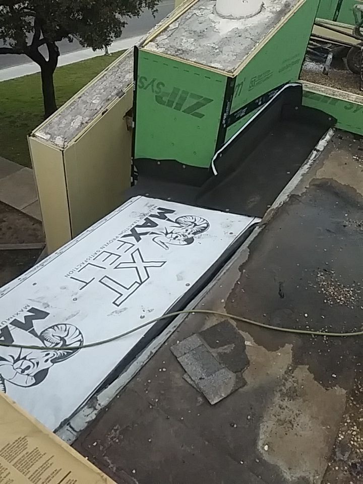 Apartment Roof Replacement by First Out Roofing 