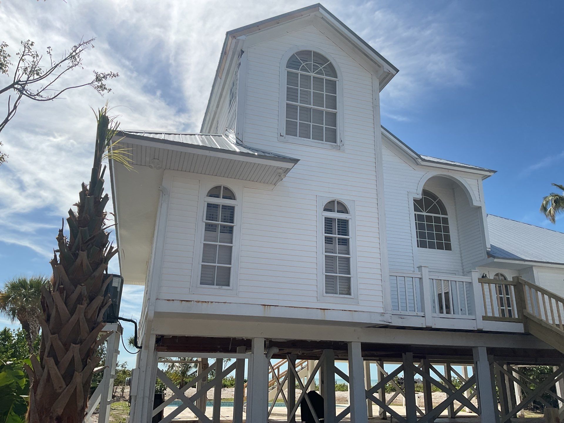 Downspout Installation using Downspout Extension in Sanibel FL by Gutter Professors