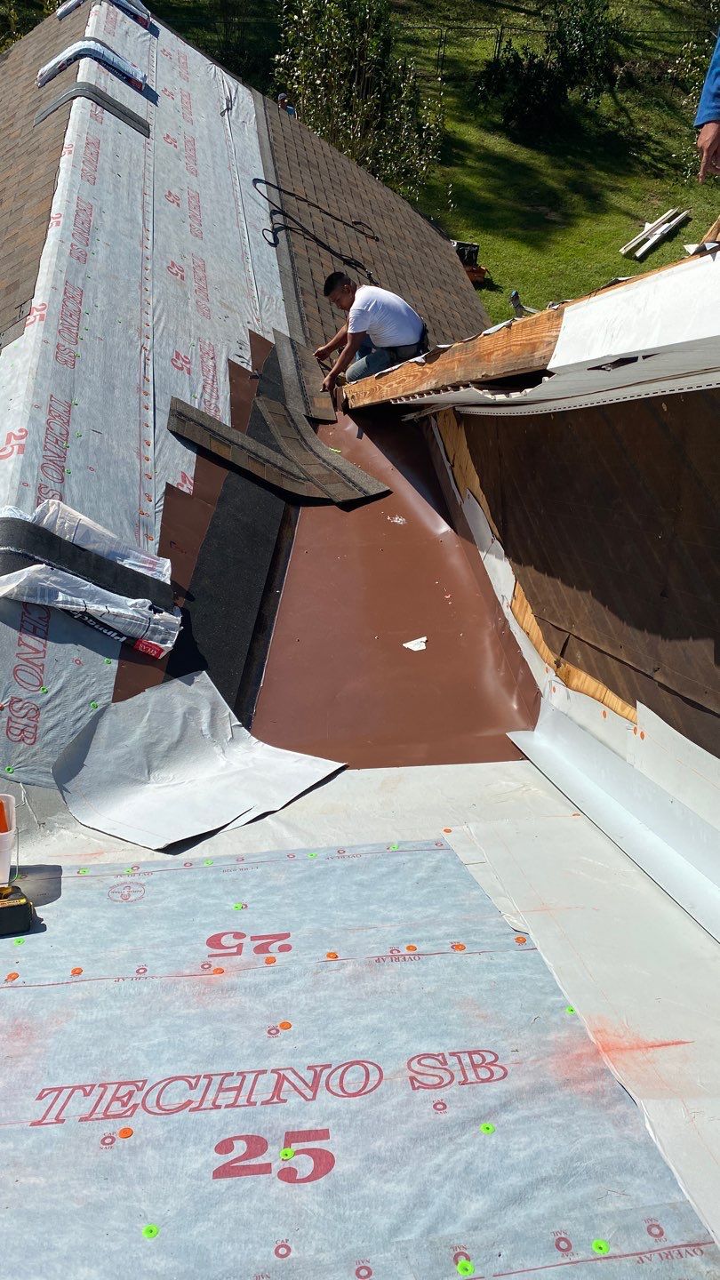Residential Roofing Installation using Roof Replacement by American Roofing & Construction LLC