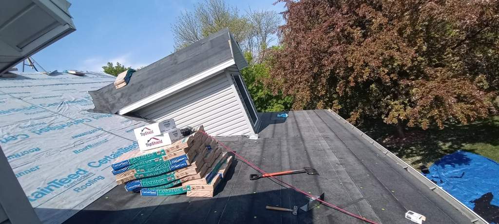 Residential Roofing Installation using Certainteed Landmark Moire Black by MODERN EXTERIOR SYSTEMS