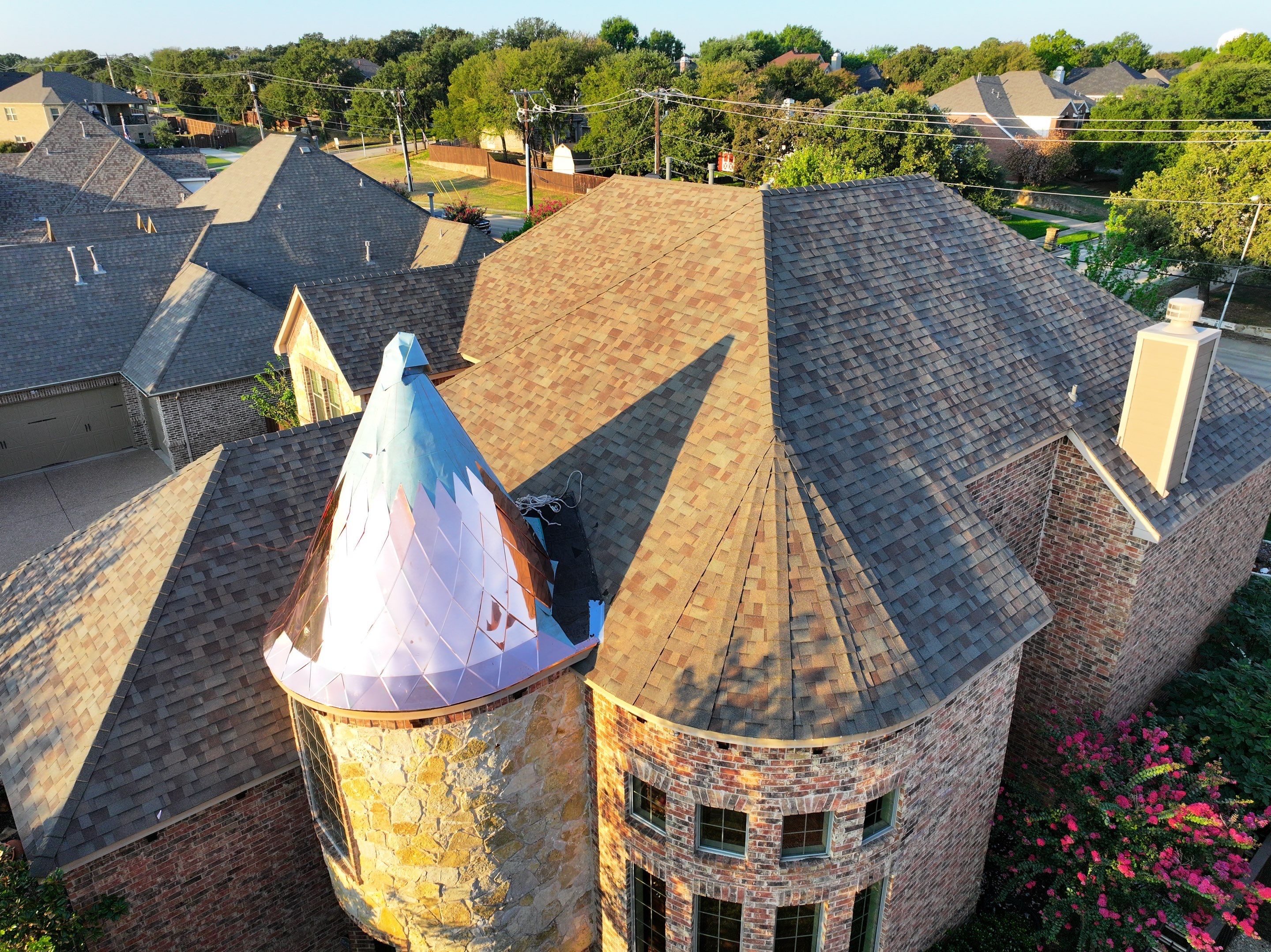 Installing Custom copper turret and Malarkey Vista Class 4 shingles Hail Damage Upgrade by Becker Roofing and Exteriors