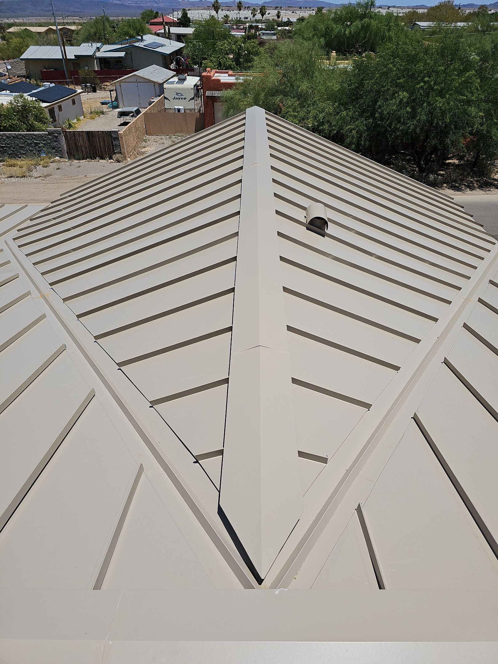 Champagne Standing Seam by Reimagine Roofing