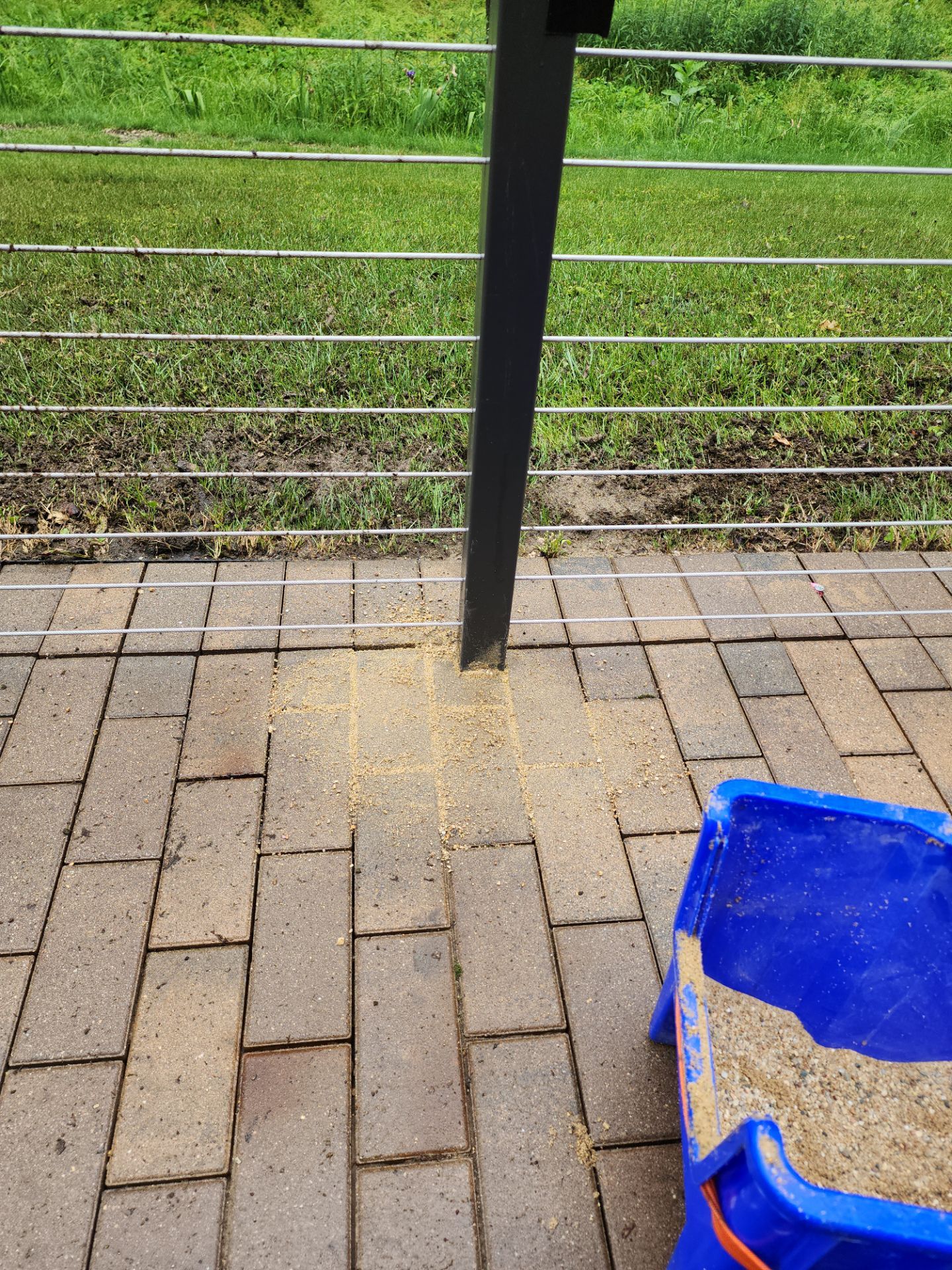 Brick paver repair, cleaning, sealing and poly sanding by Northern Power Washing LLC.