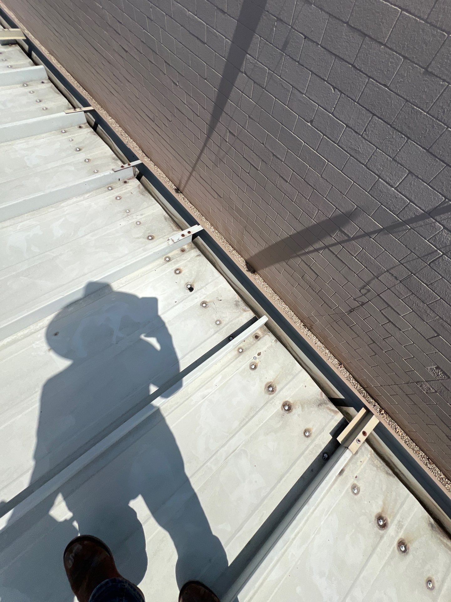 Commercial Roofing Repair using Metal by Roof Repair Company