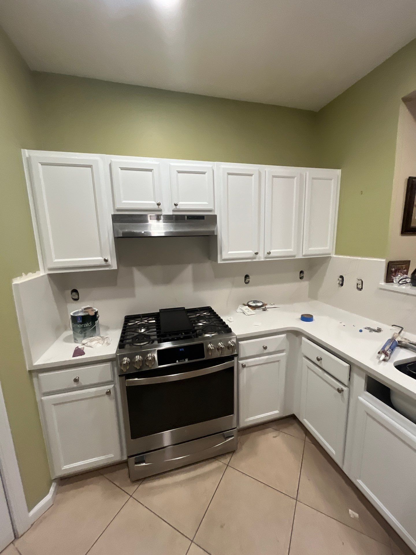 Cabinet Painting - wood to white by Five Star Painting