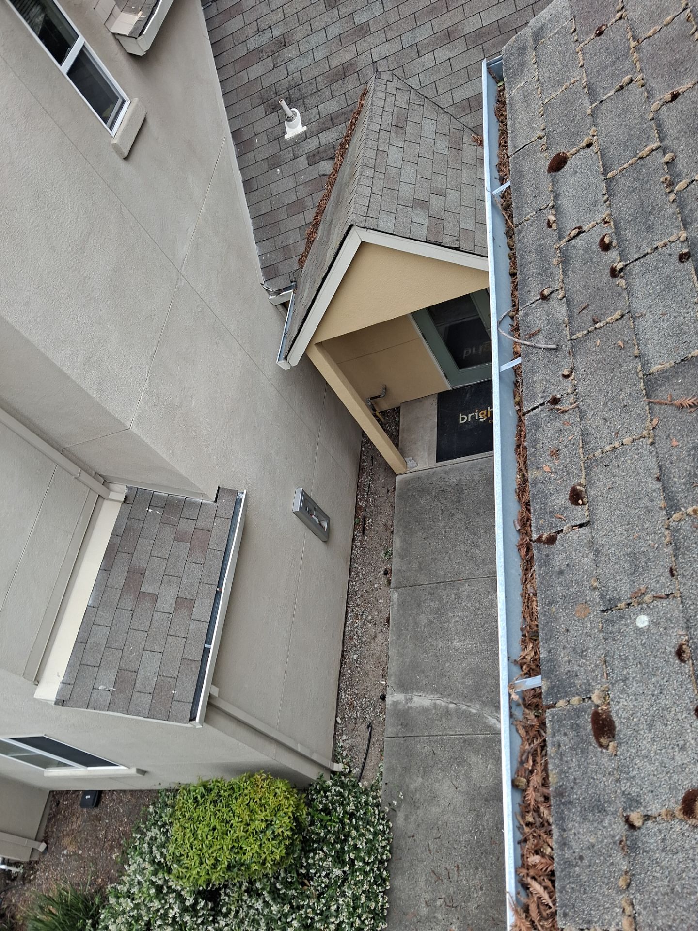 Commercial gutter cleaning Santa Rosa before photo with filled gutters