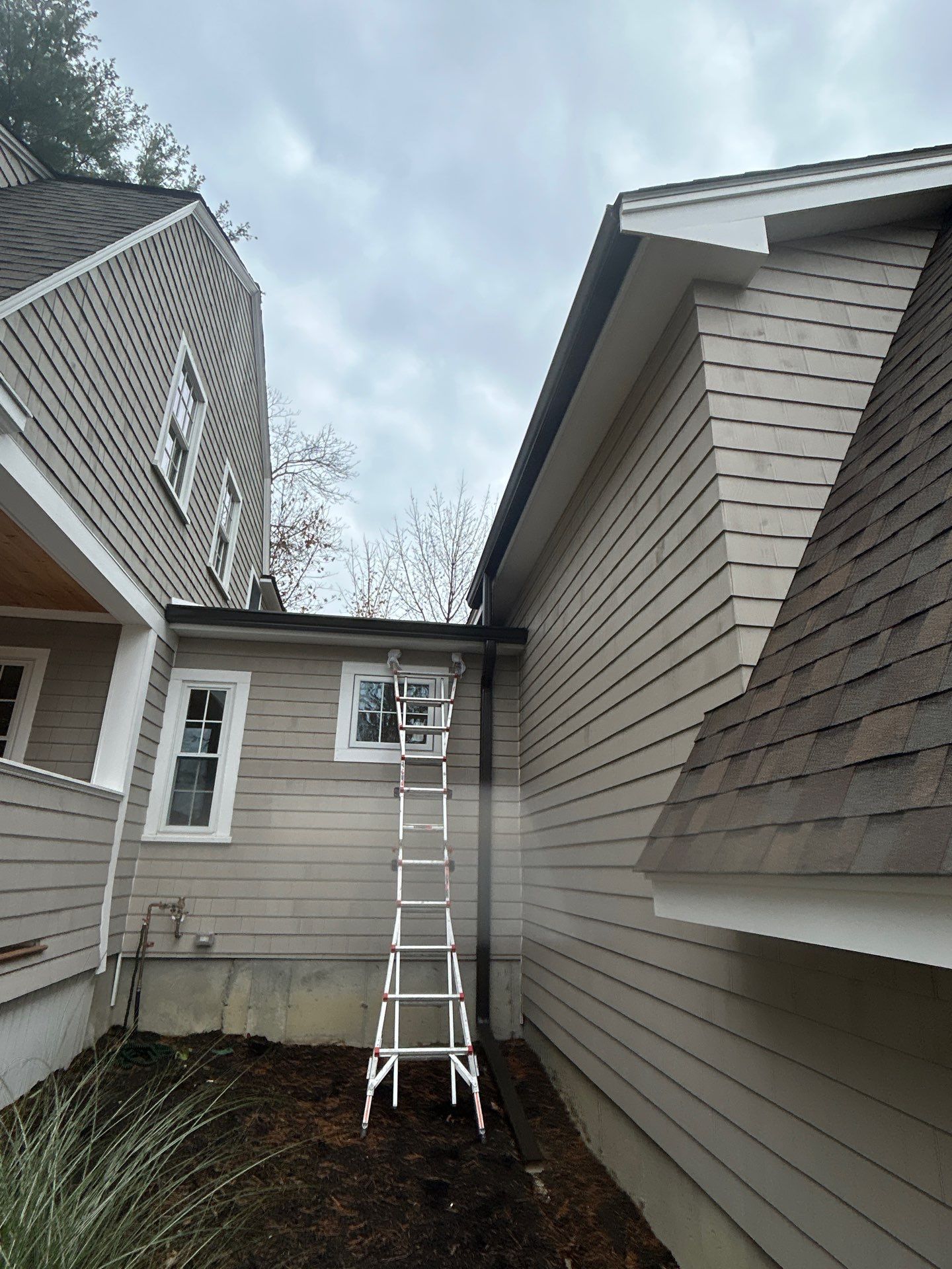 Andover Complete Gutter System with T-Rex Guards & Valley Splashguard by Mighty Dog Roofing of Greater Middlesex County