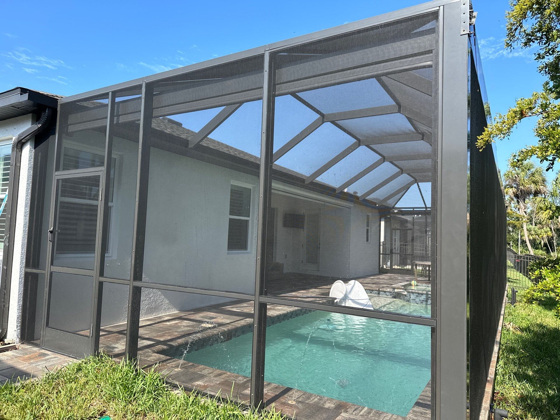 Screen Enclosure & Paver Pool Deck Cleaning in Trevesta Community, Palmetto, FL | Sunshine AquaWash by Sunshine AquaWash