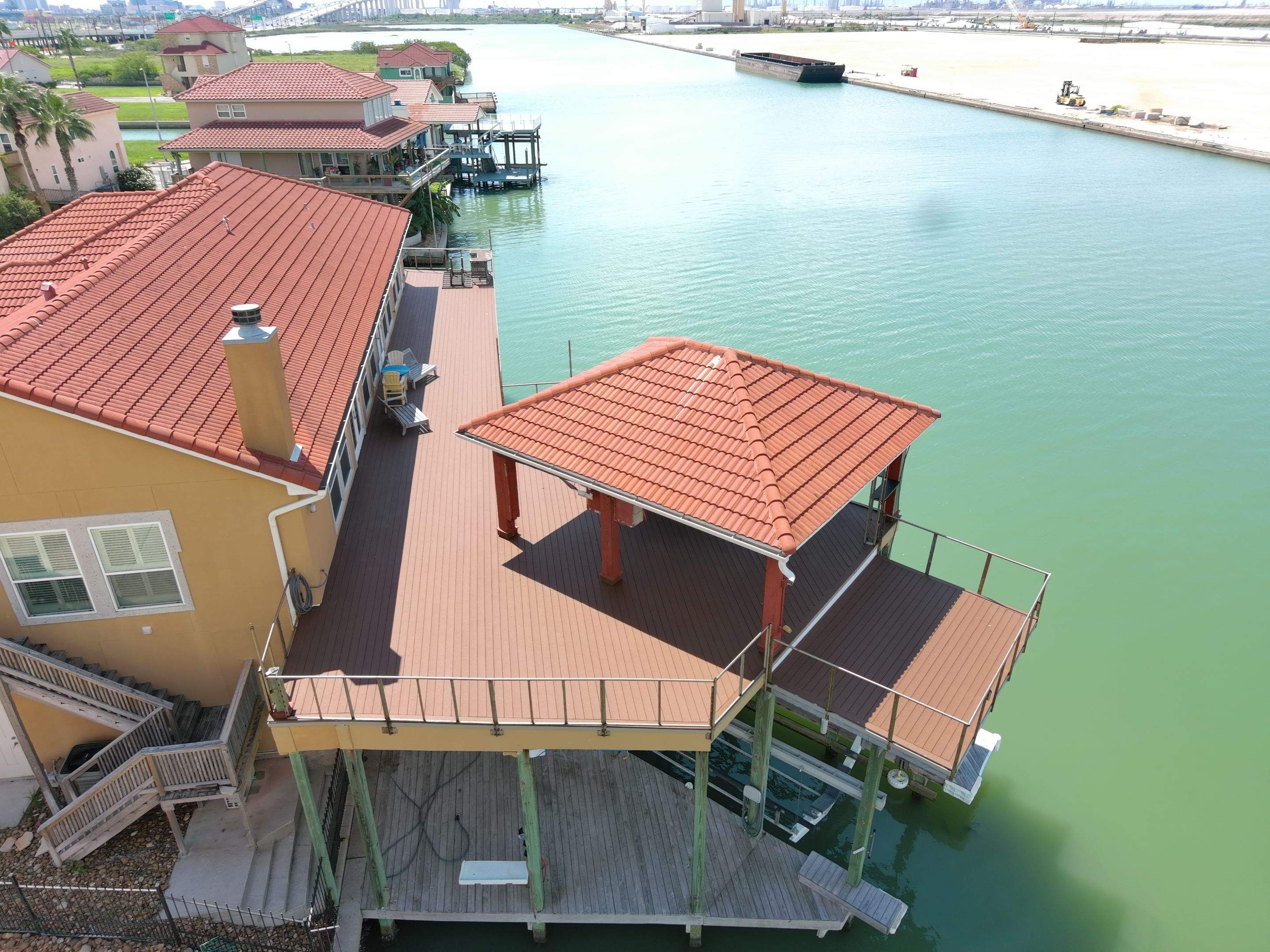 Waterfront Walkout Waterproofed! by Bayfront Roofing and Construction