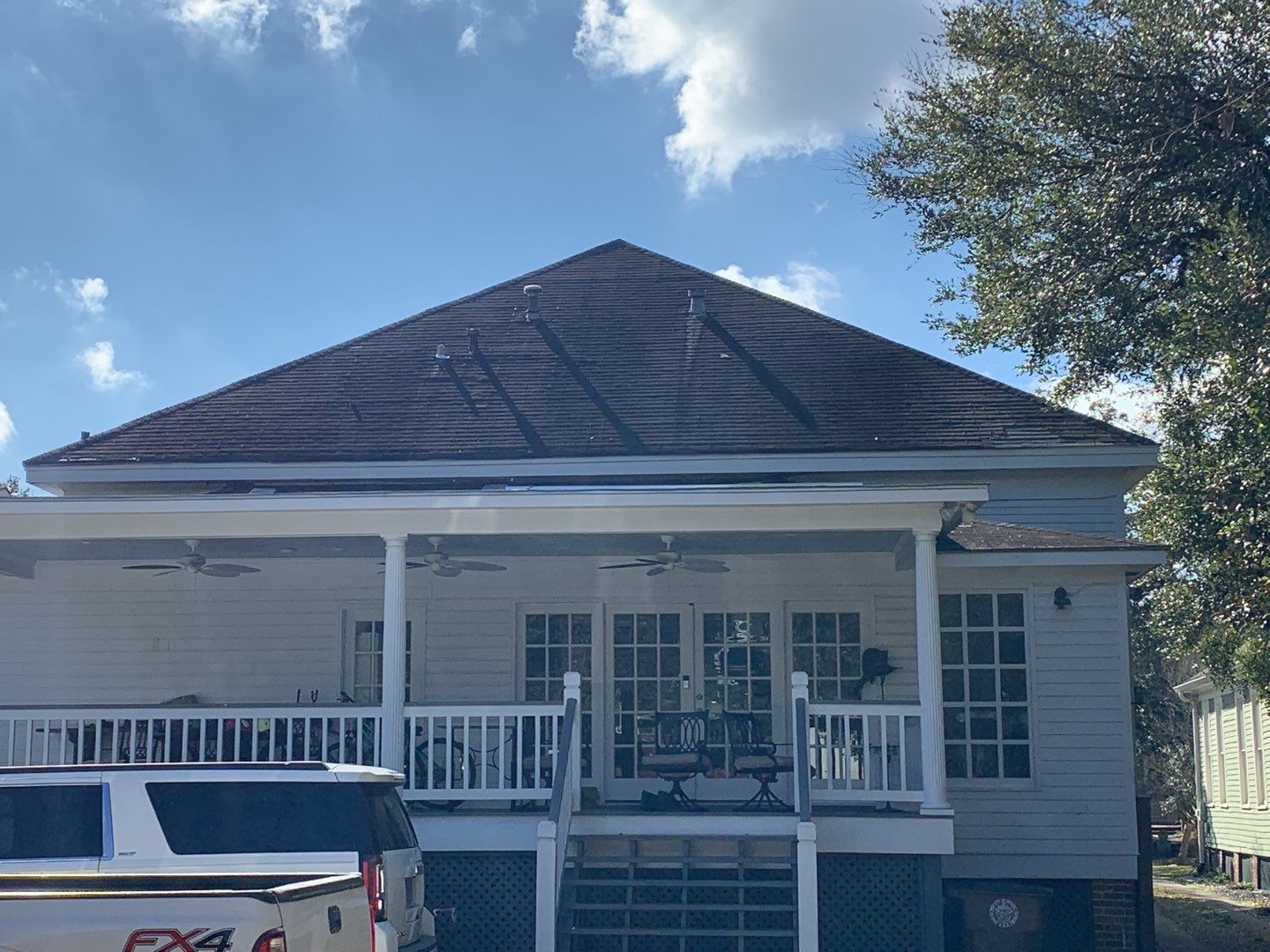 Residential Roofing Installation using Roof Replacement by American Roofing & Construction LLC