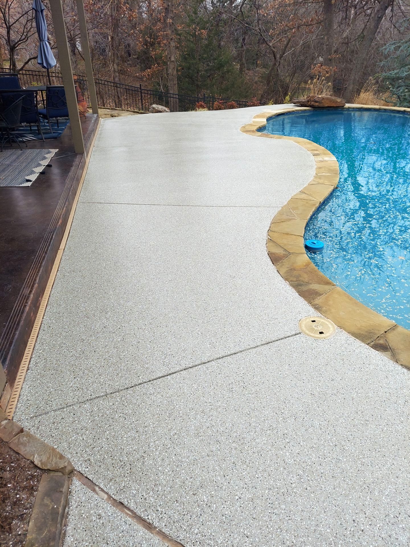Pool Deck Install with Pebble Beach by Copperhead Coatings