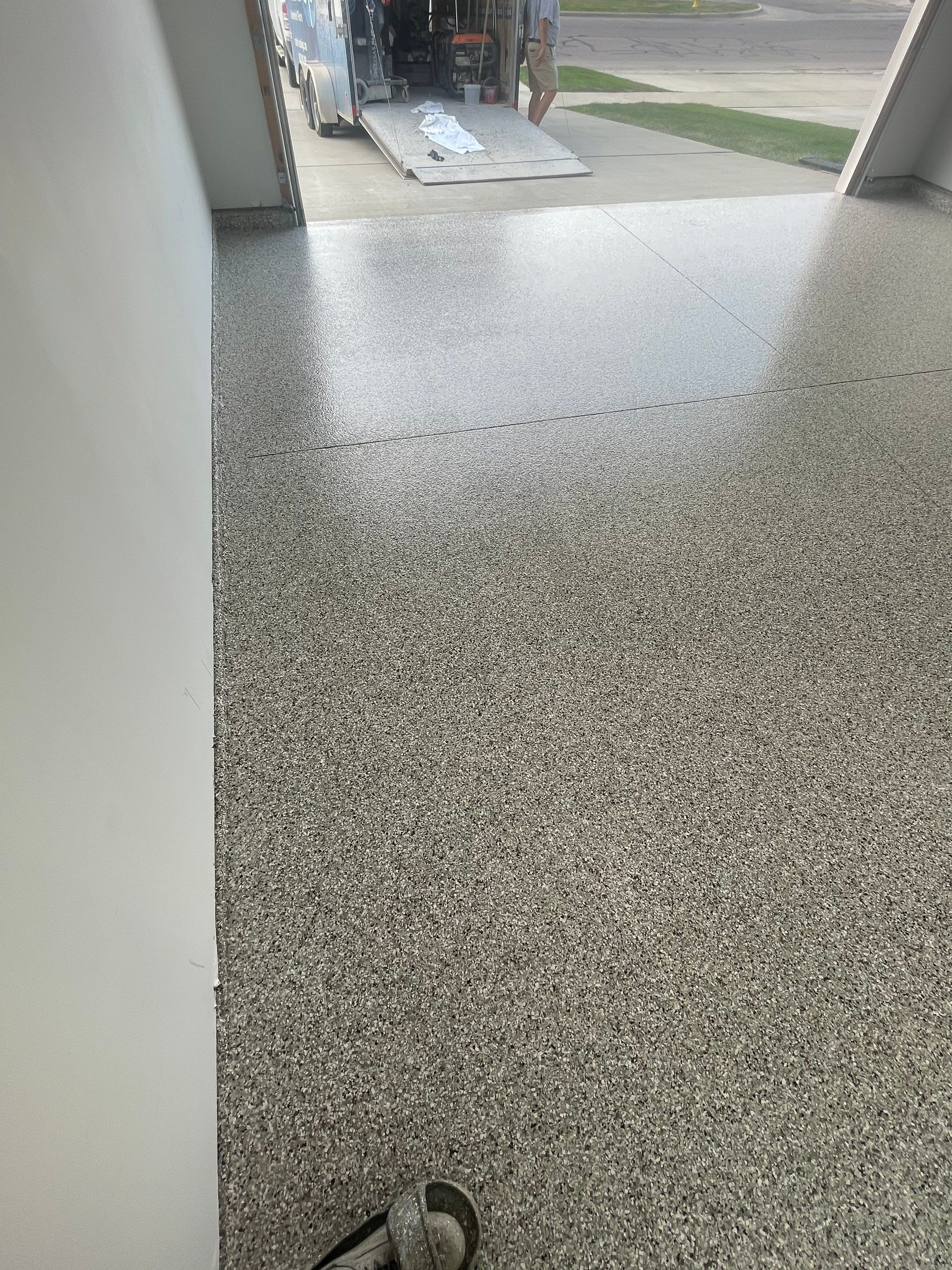 Custom Coyote Flake Garage Floor Coating in Sioux Falls by Select Painting, Coatings & Garage Cabinets