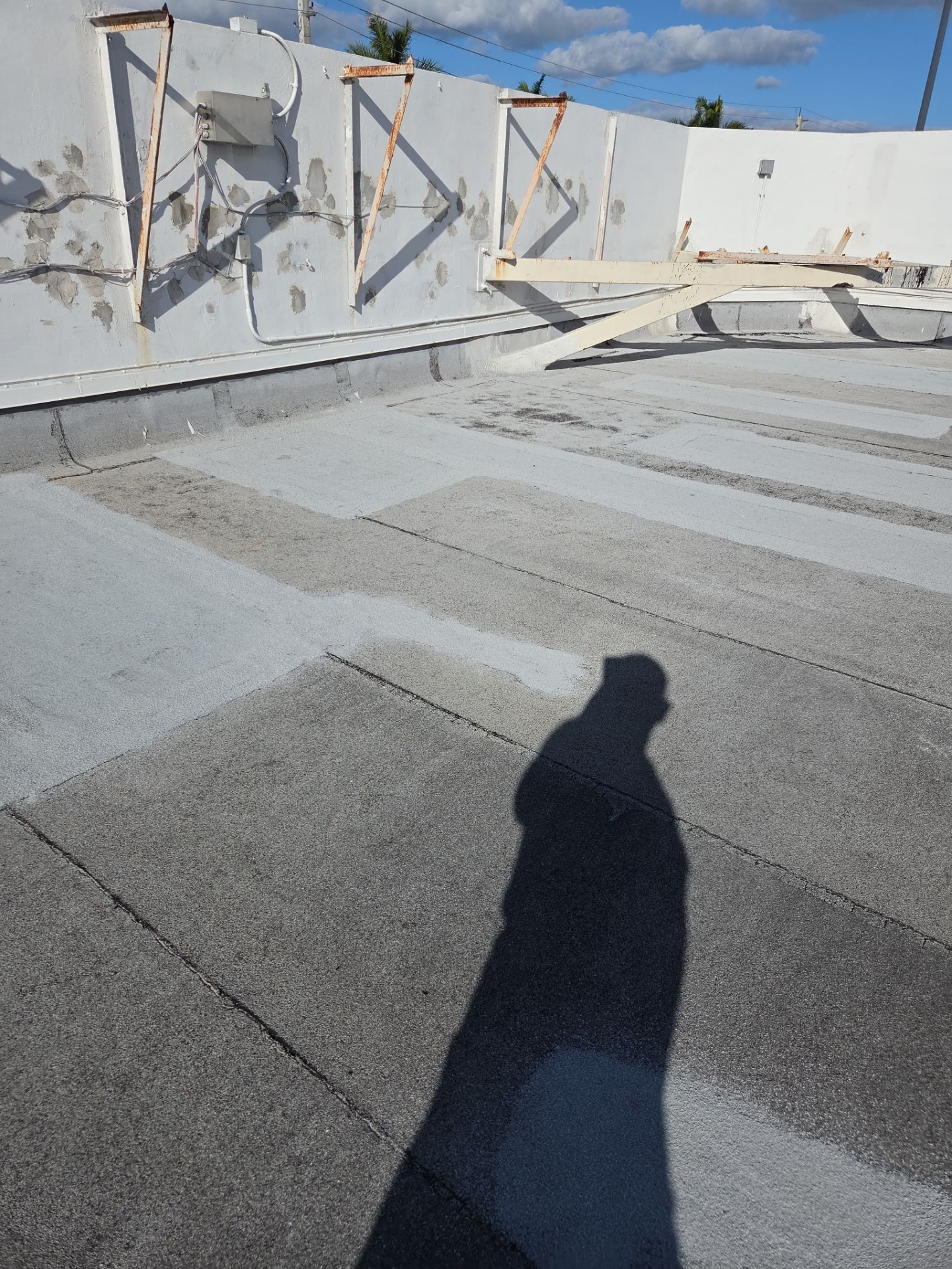 Commercial Flat Roof Restoration Using Silicone Coating in Hallandale Beach by Aastro Roofing