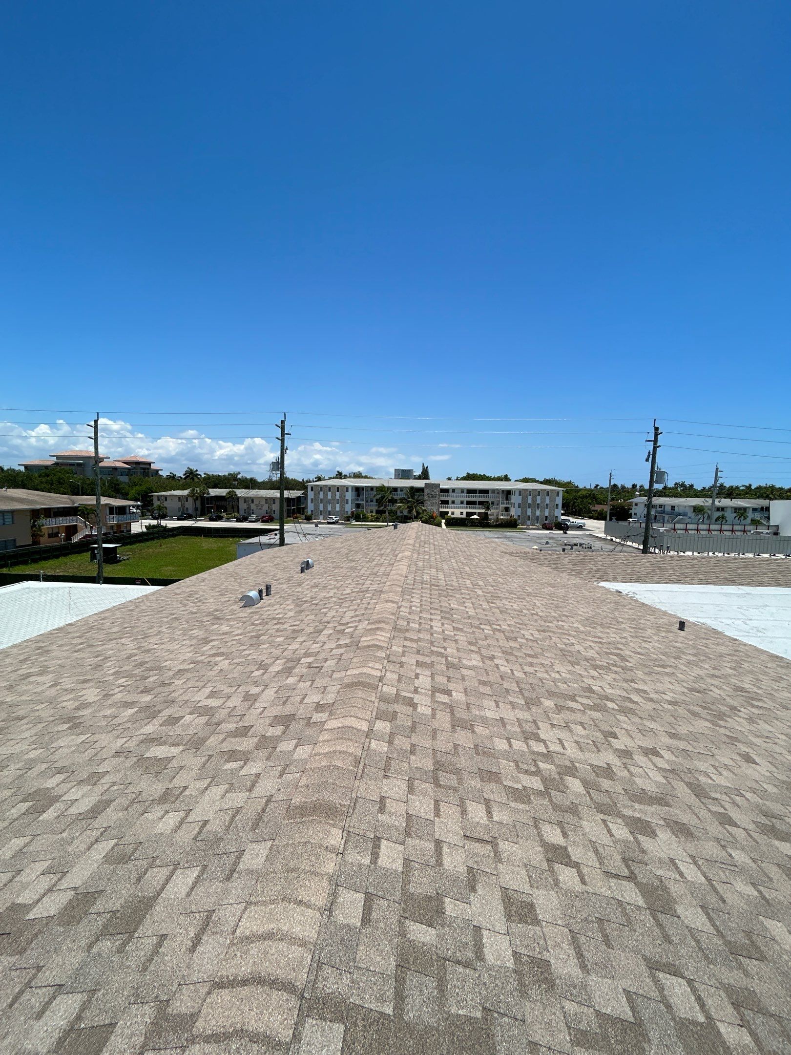 Commercial Roofing Installation using CERTAINTEED LANDMARK AR (SUNRISE CEDAR) by Earl W. Johnston Roofing 