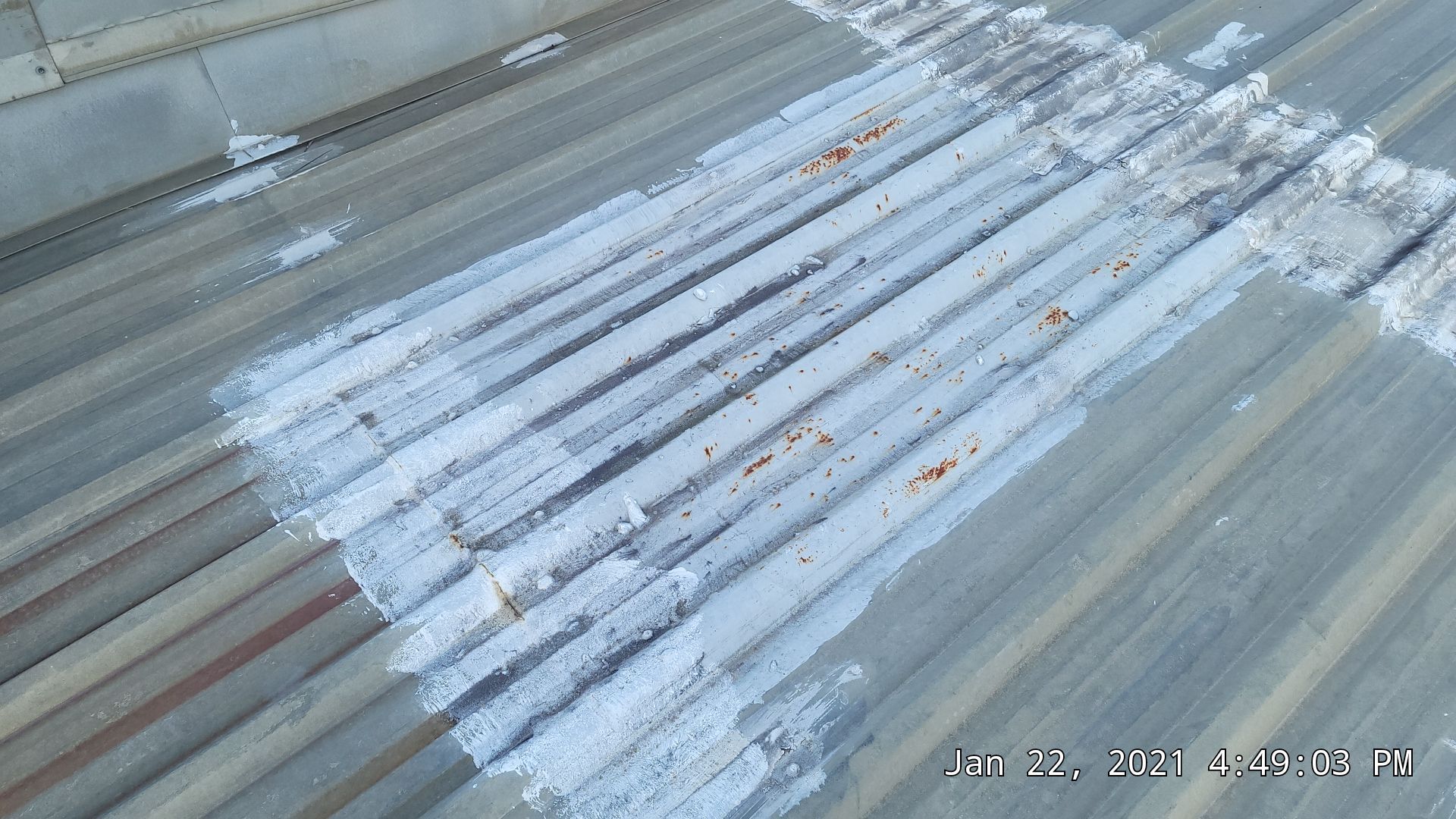 Commercial Roofing Installation using Aldocoat Coatings by Hostetler Roofing