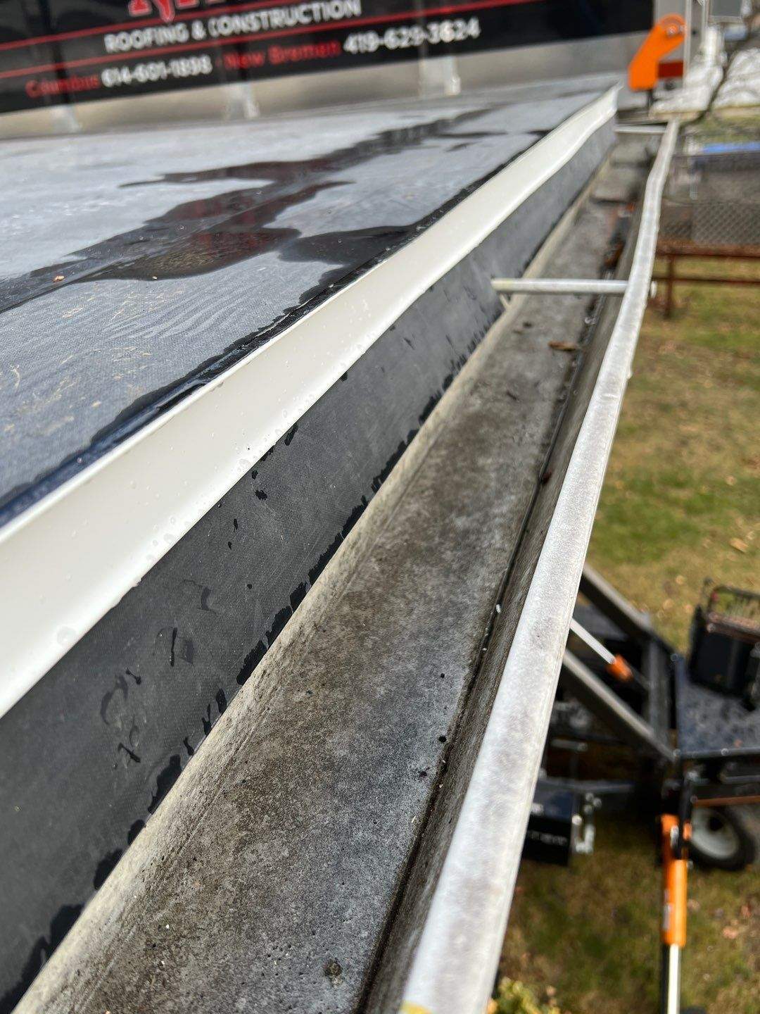 Residential Roofing Installation using 60 mil rubber roof by Nitro Roofing and Construction