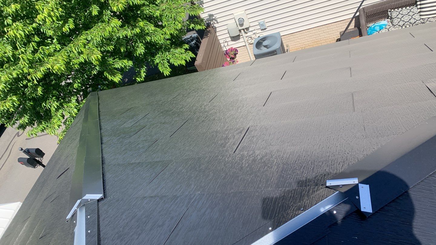 Tesla Solar Roof using Tesla Solar Roof V3 tiles by American Home Contractors