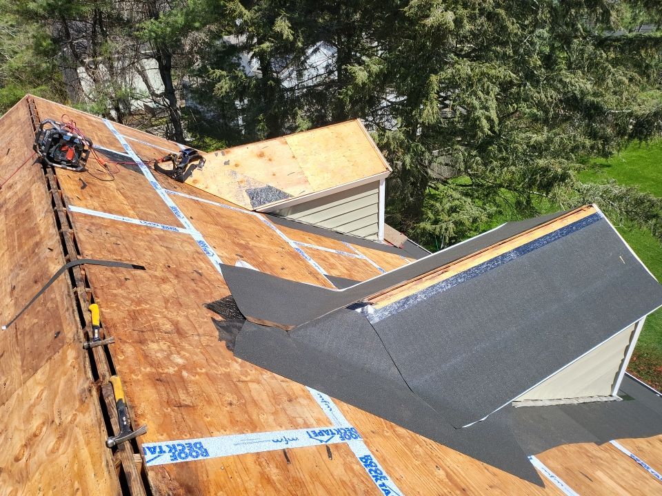 Residential Roofing Installation using onyx black by A Plus Exterior