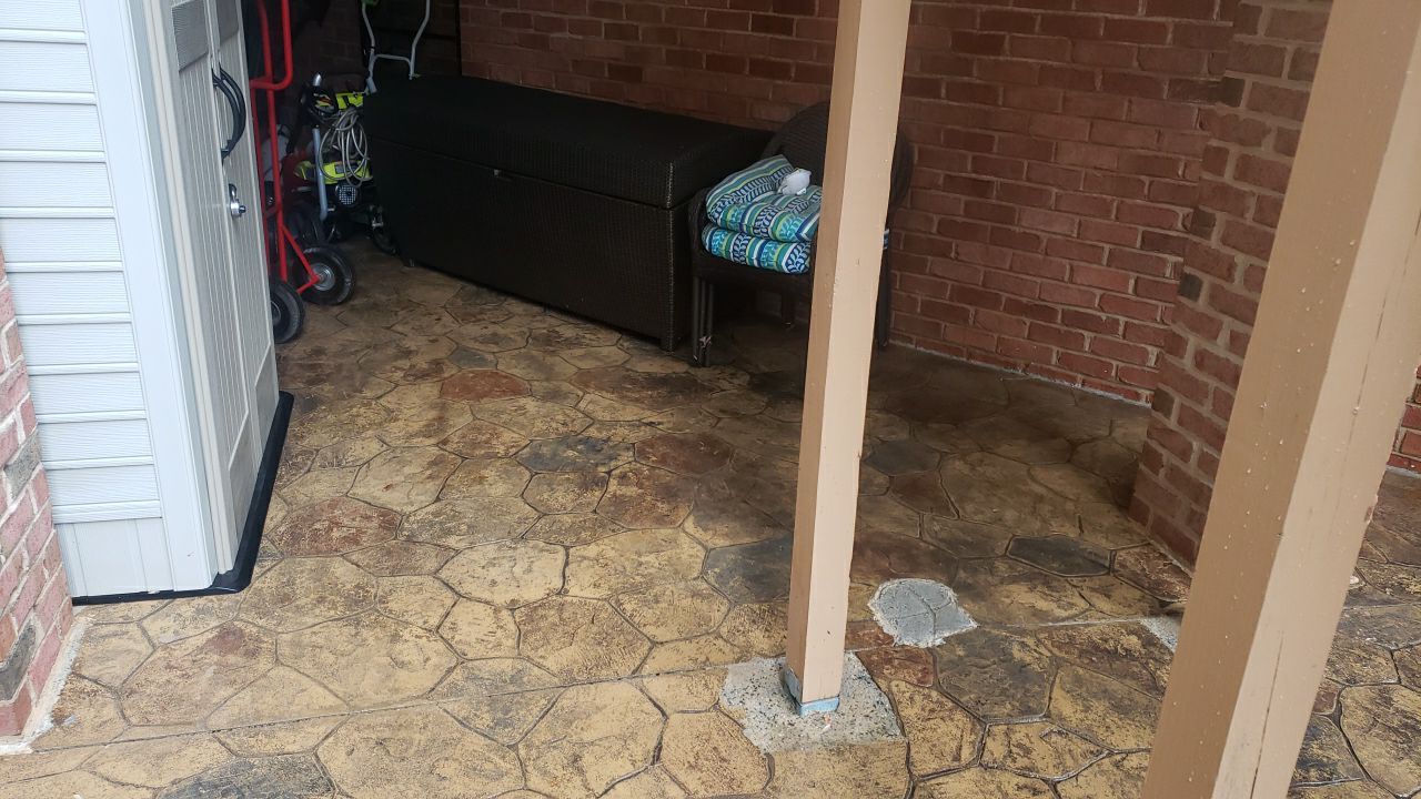 patio cleaning using cleaner by Power Wash Masters LLC