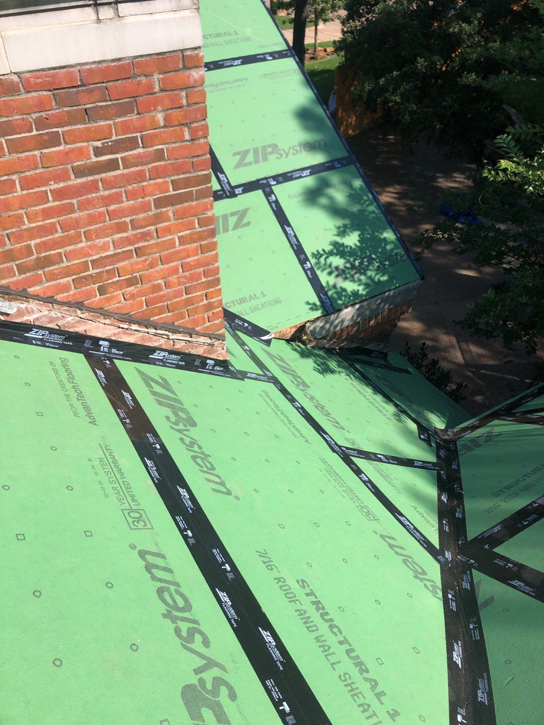 Designer Residential Roof with Zip System by Springtree Restoration