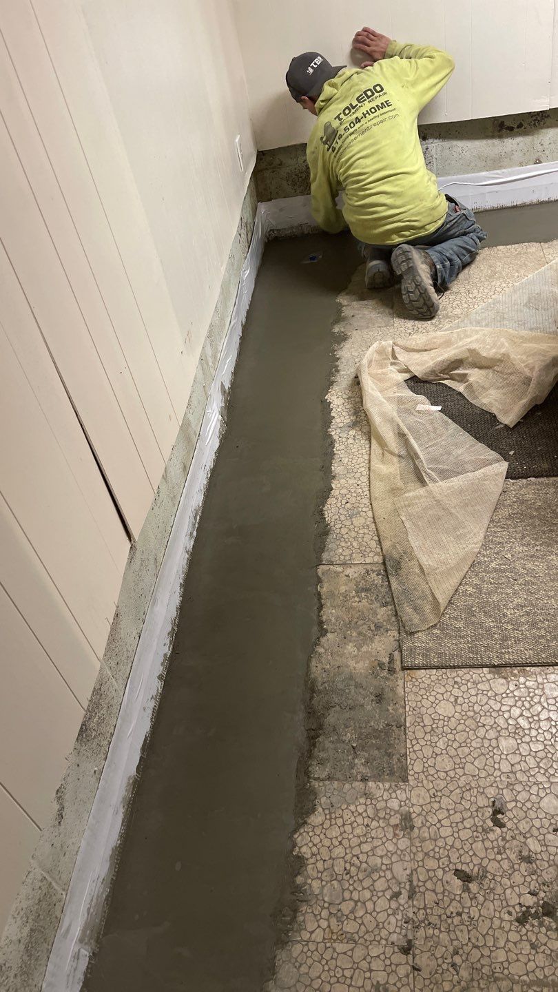 Interior Waterproofing Using GrateDrain™ Products by Toledo Basement Repair 