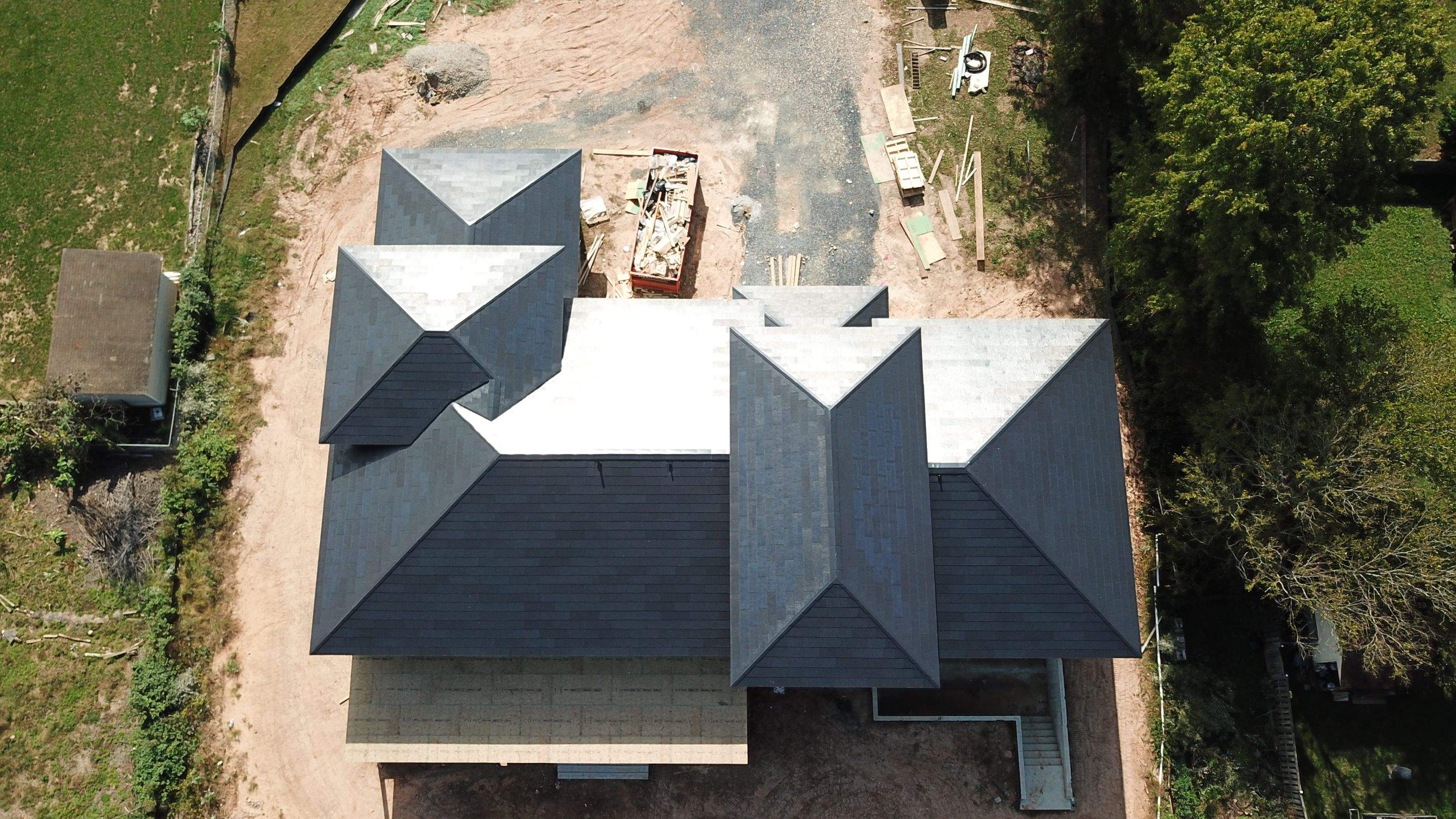 Tesla Solar Roof  using Tesla Solar Roof V3 tiles by American Home Contractors