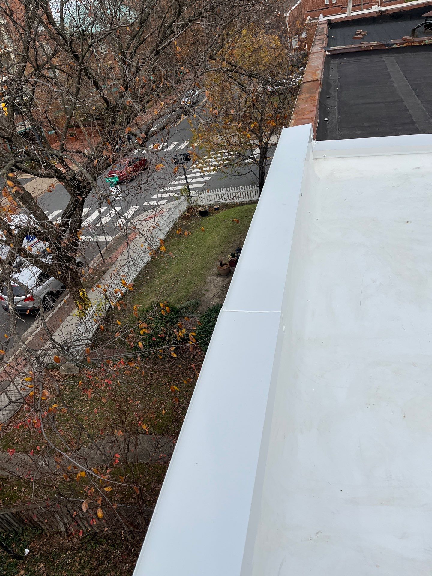 Alexandria: Residential Flat Roof Replacement with Mule Hide TPO Membrane by RM Banning, Inc.
