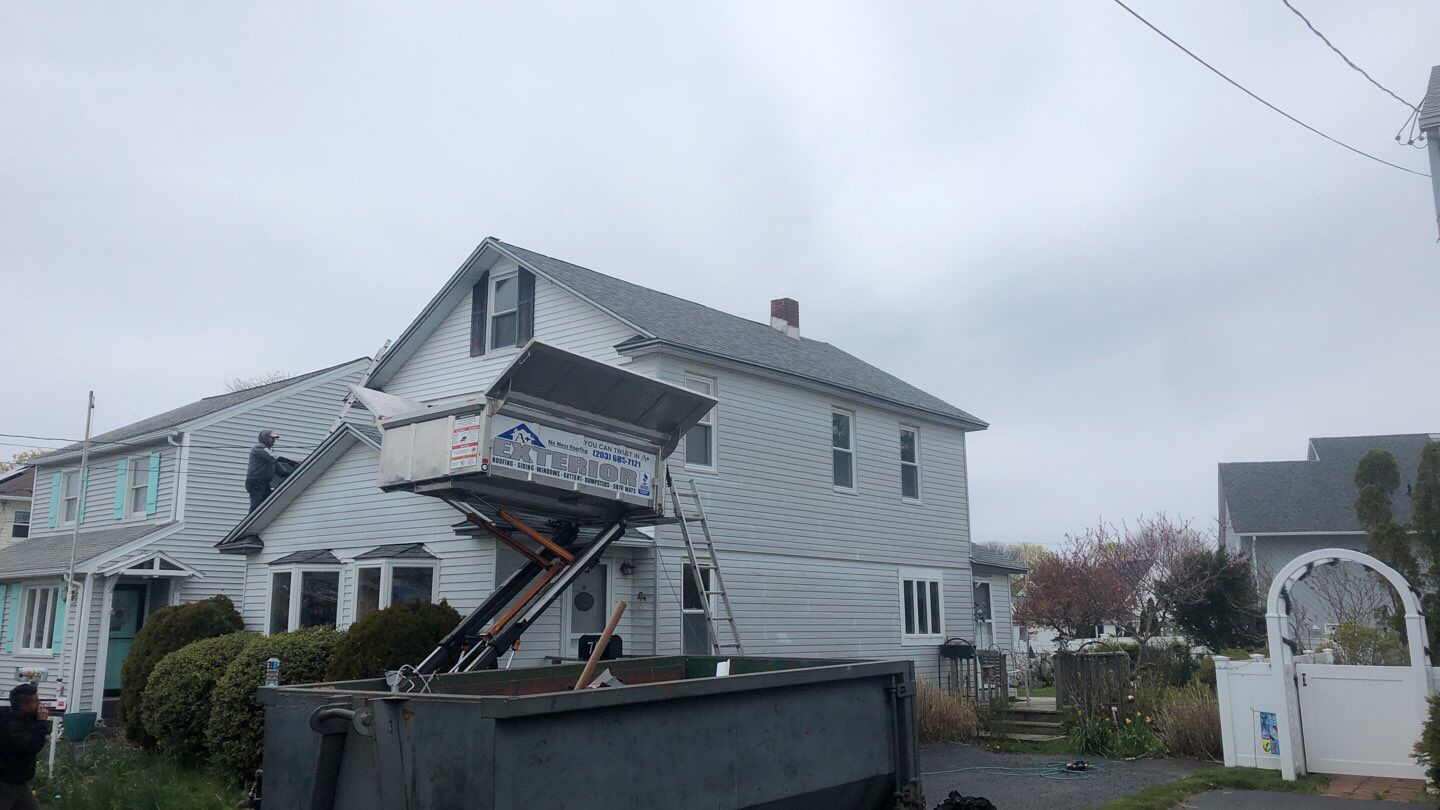 Residential Roofing Installation using Owens Corning Duration Slatestone Gray by A Plus Exterior