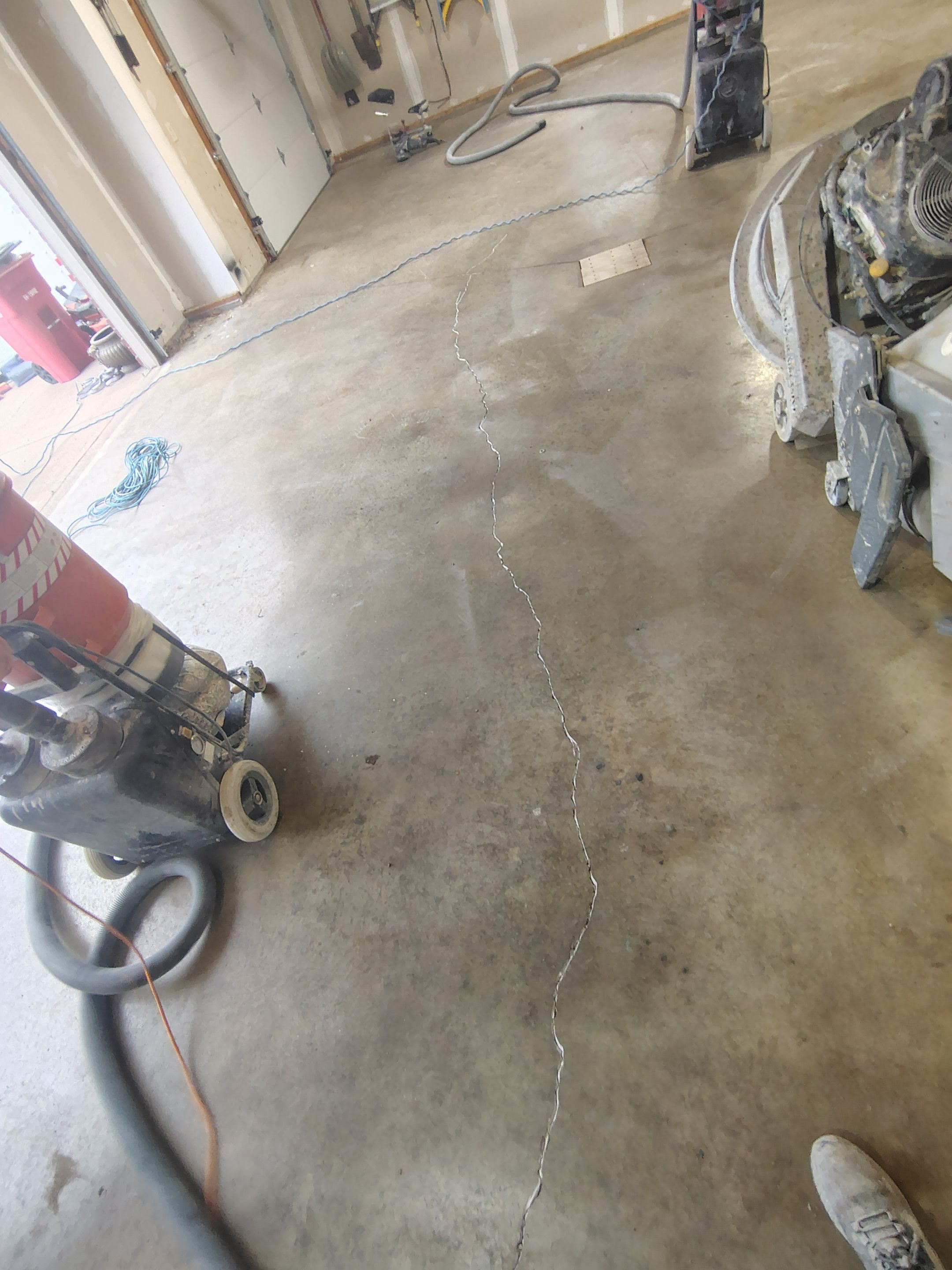 Sioux Falls Garage Concrete Grinding and Nightfall Decorative Chip Coating by Select Painting, Coatings & Garage Cabinets