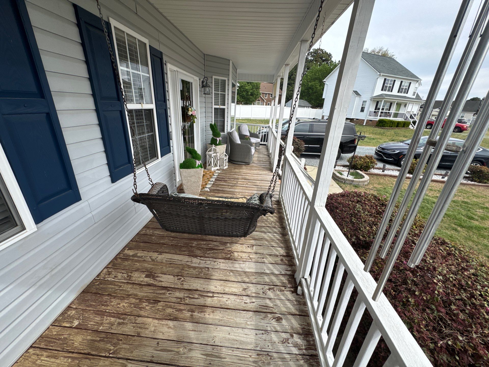 Willow Spring Composite Deck Resurface and Black Railing Upgrade by The Remodeling Company