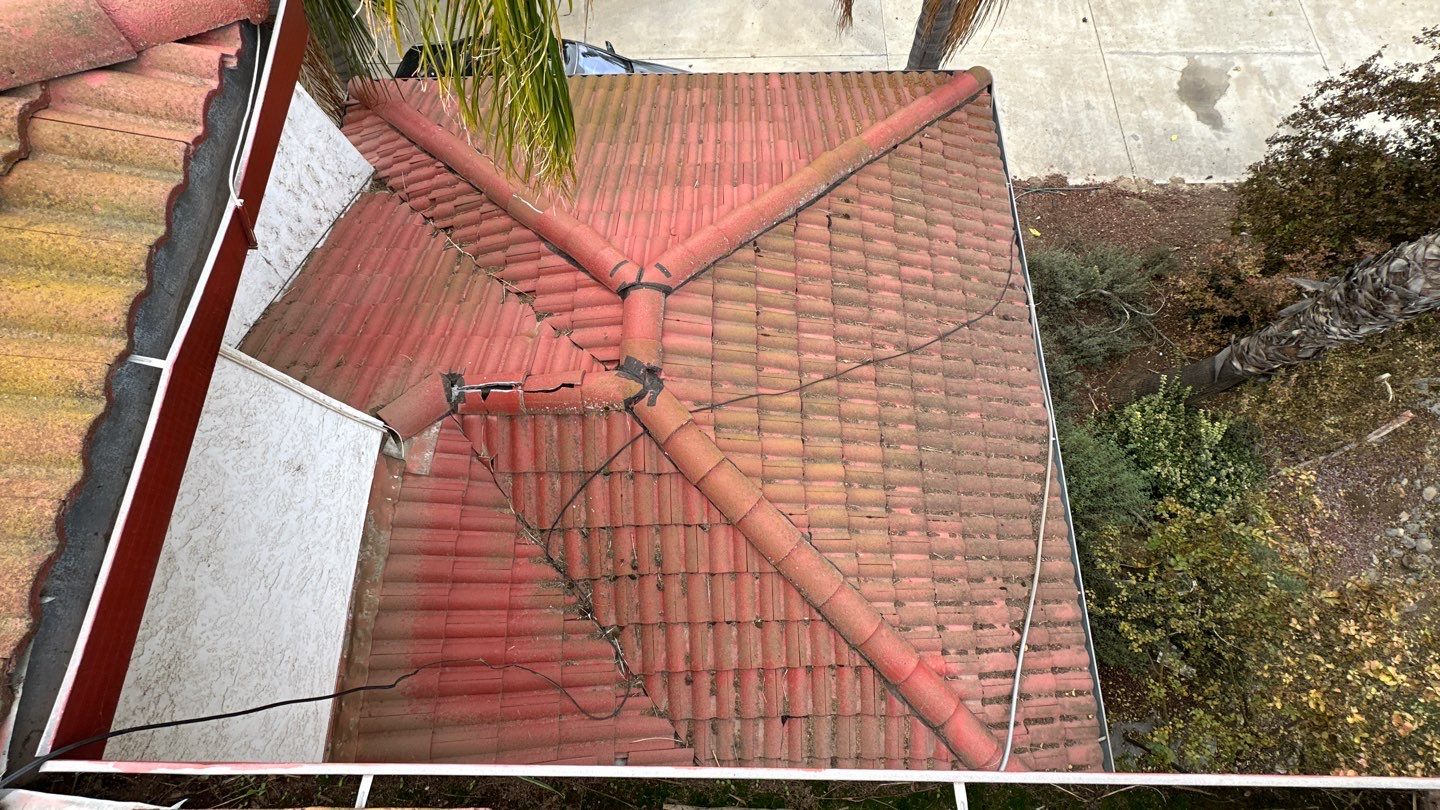 Tile refurbish project using existing tiles and replaced underlayment and battens by Straight Edge Roofing Inc