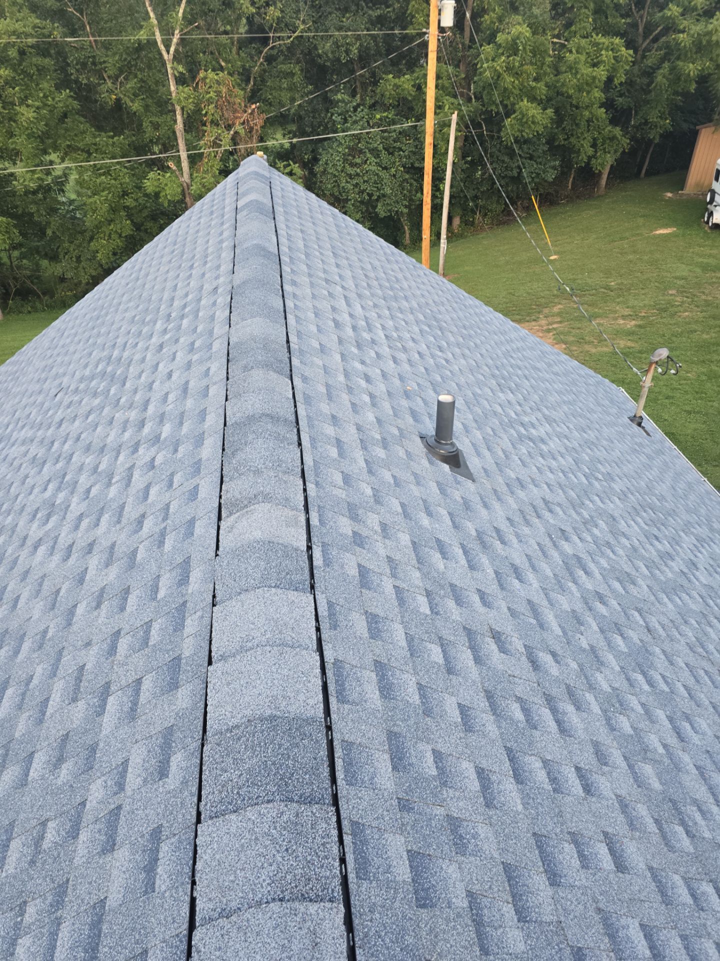 Residential Roofing Installation using GAF Timberline HDZ Charcoal by Rainstoppers Roofing