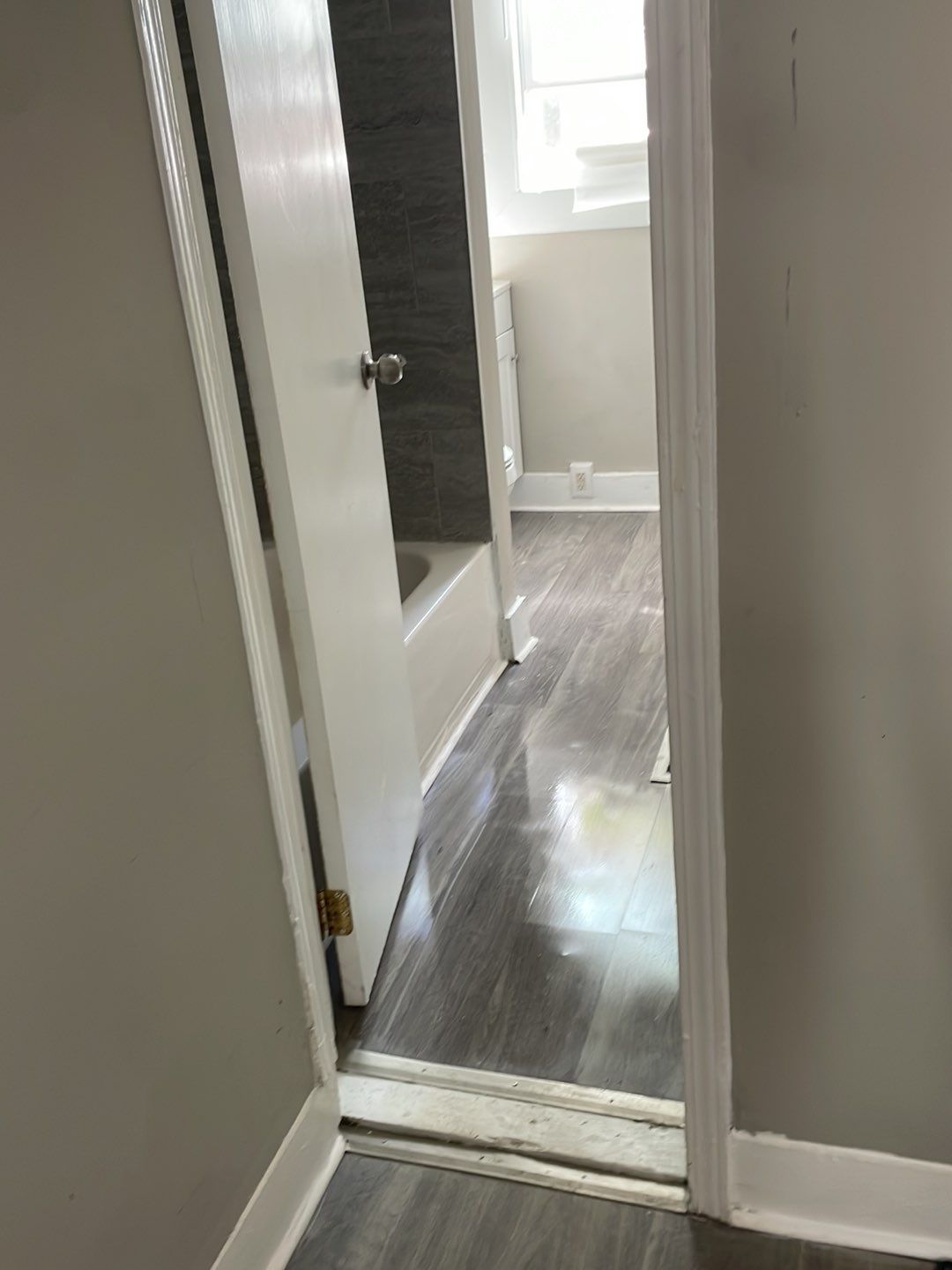 Rental Property Restoration, siding, flooring, gutters, landscaping by Storm Contracting 